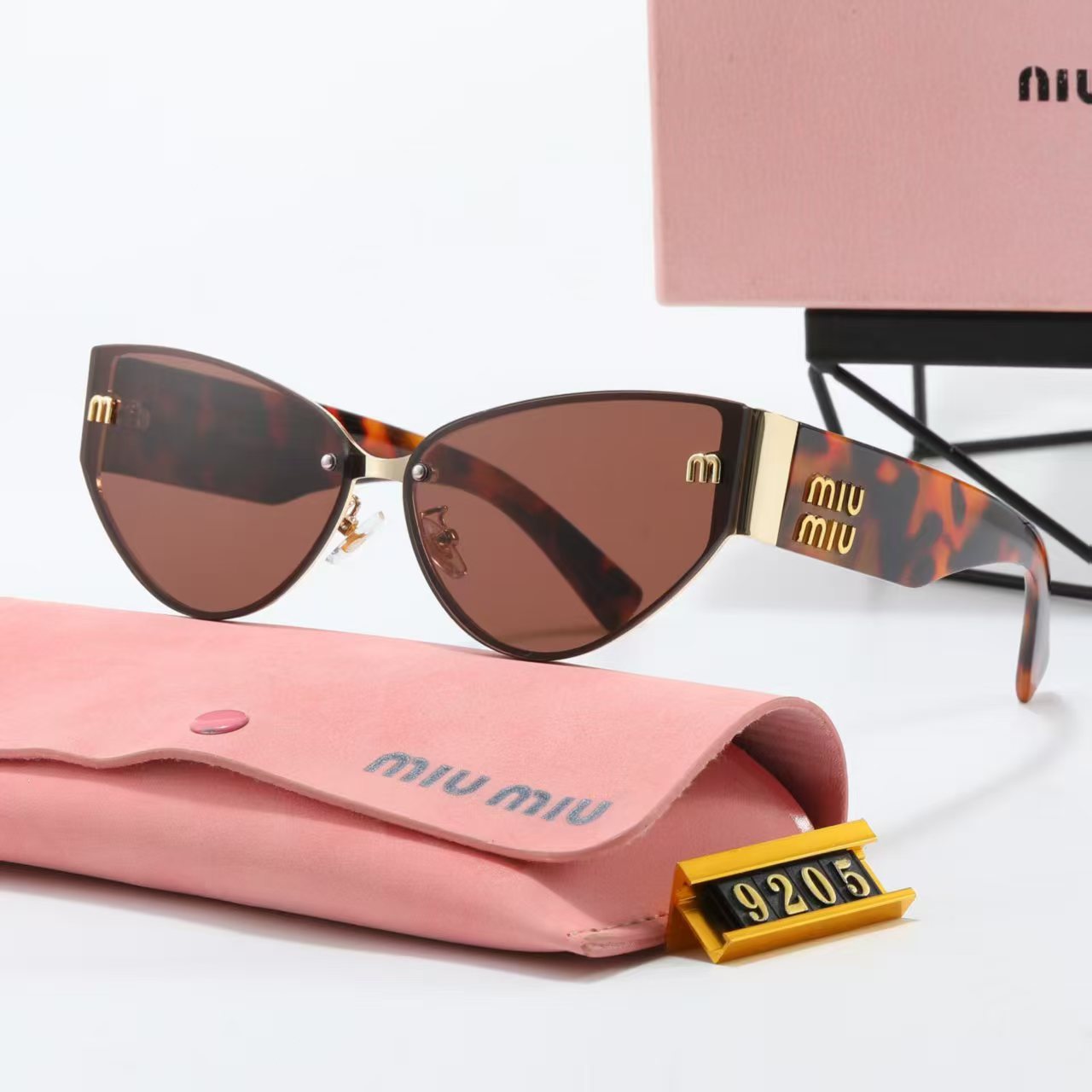 MIUMIU cat-eye playful sunglasses