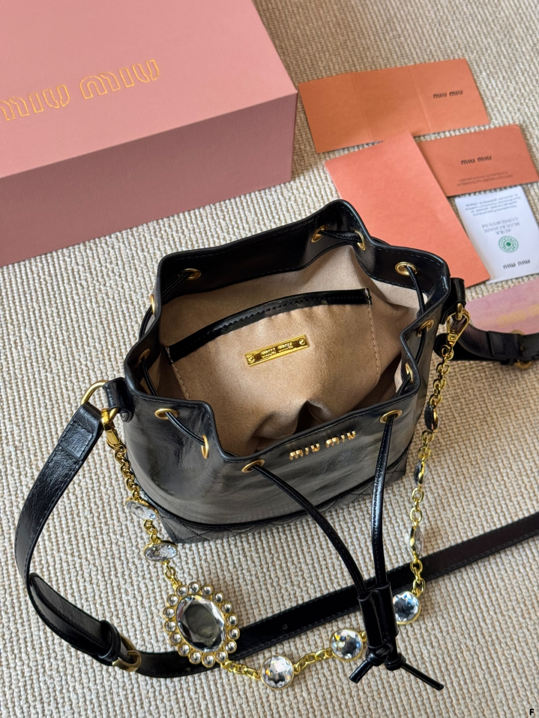 MiuMiu waxed leather small bucket bag