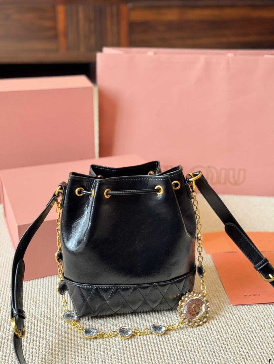MiuMiu waxed leather small bucket bag