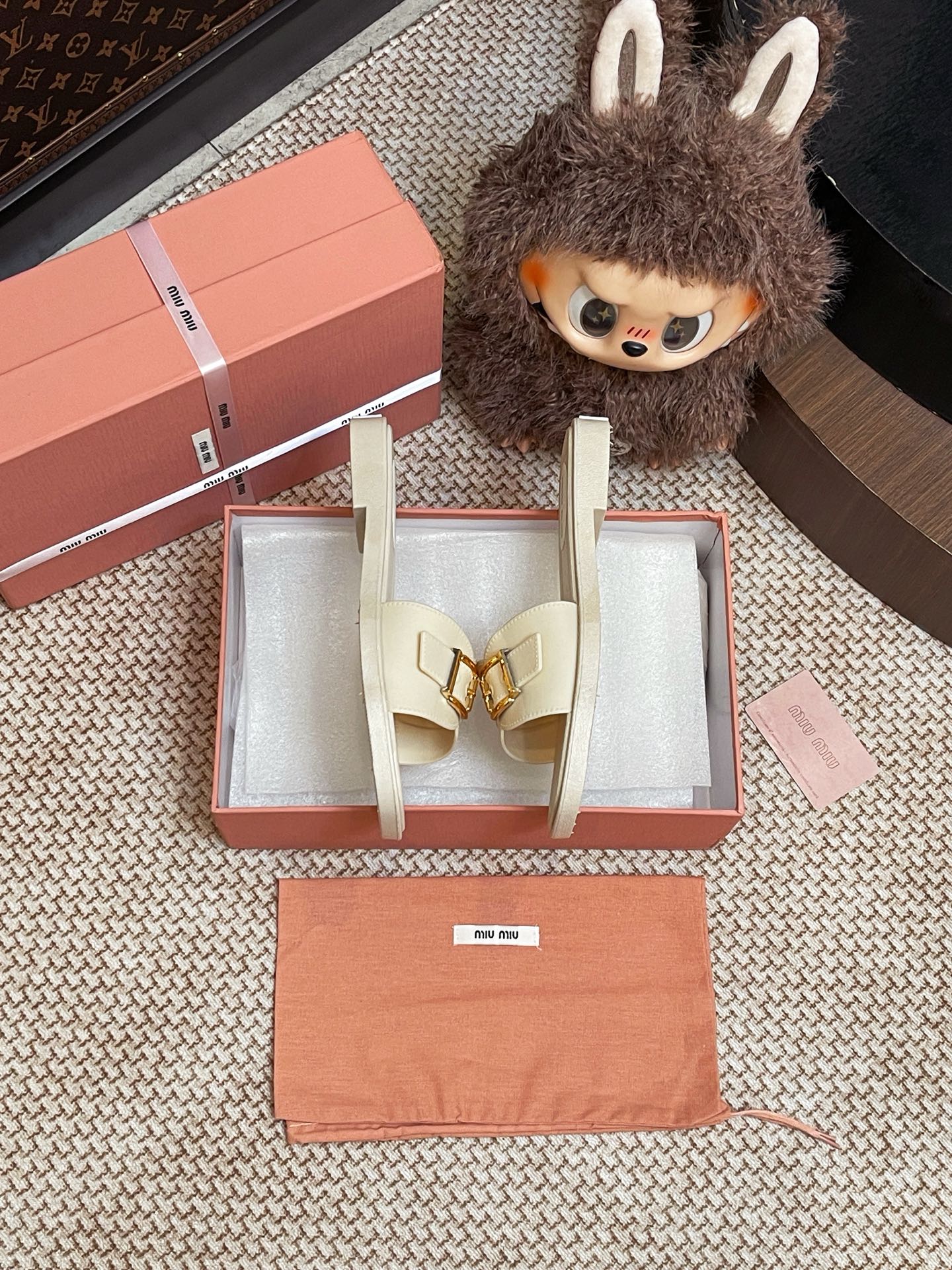 Miumiu metal buckle slippers