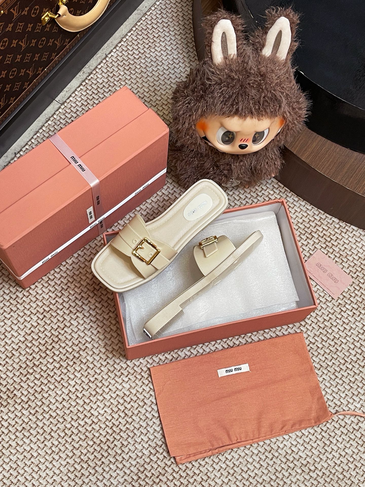 Miumiu metal buckle slippers