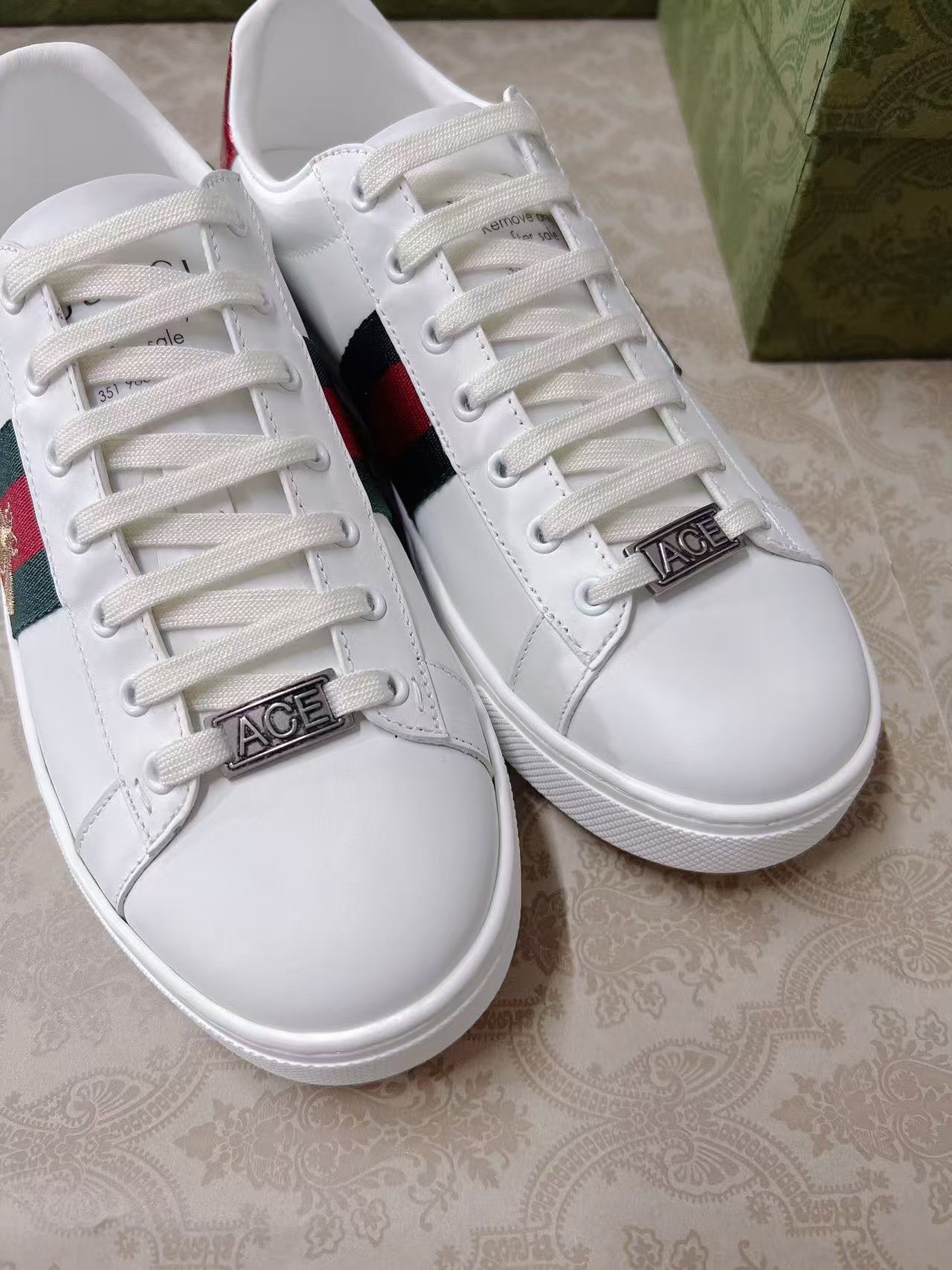 Gucci red and green snake-tail bee sneakers