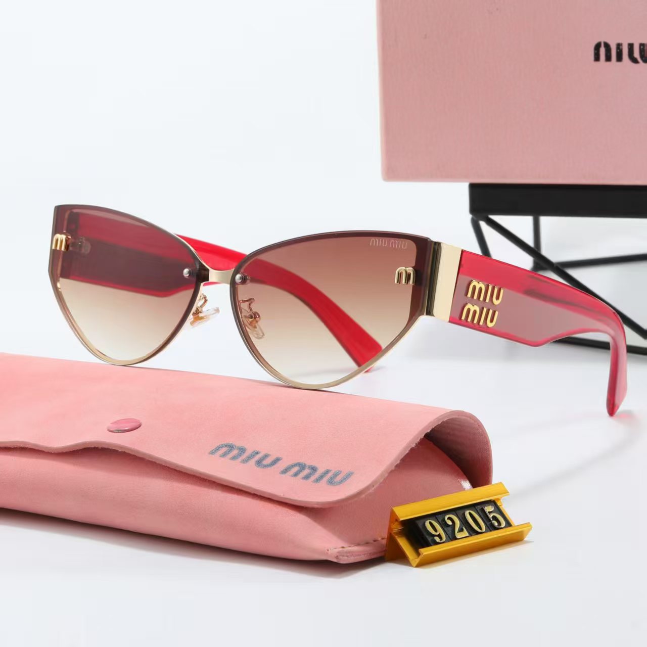MIUMIU cat-eye playful sunglasses
