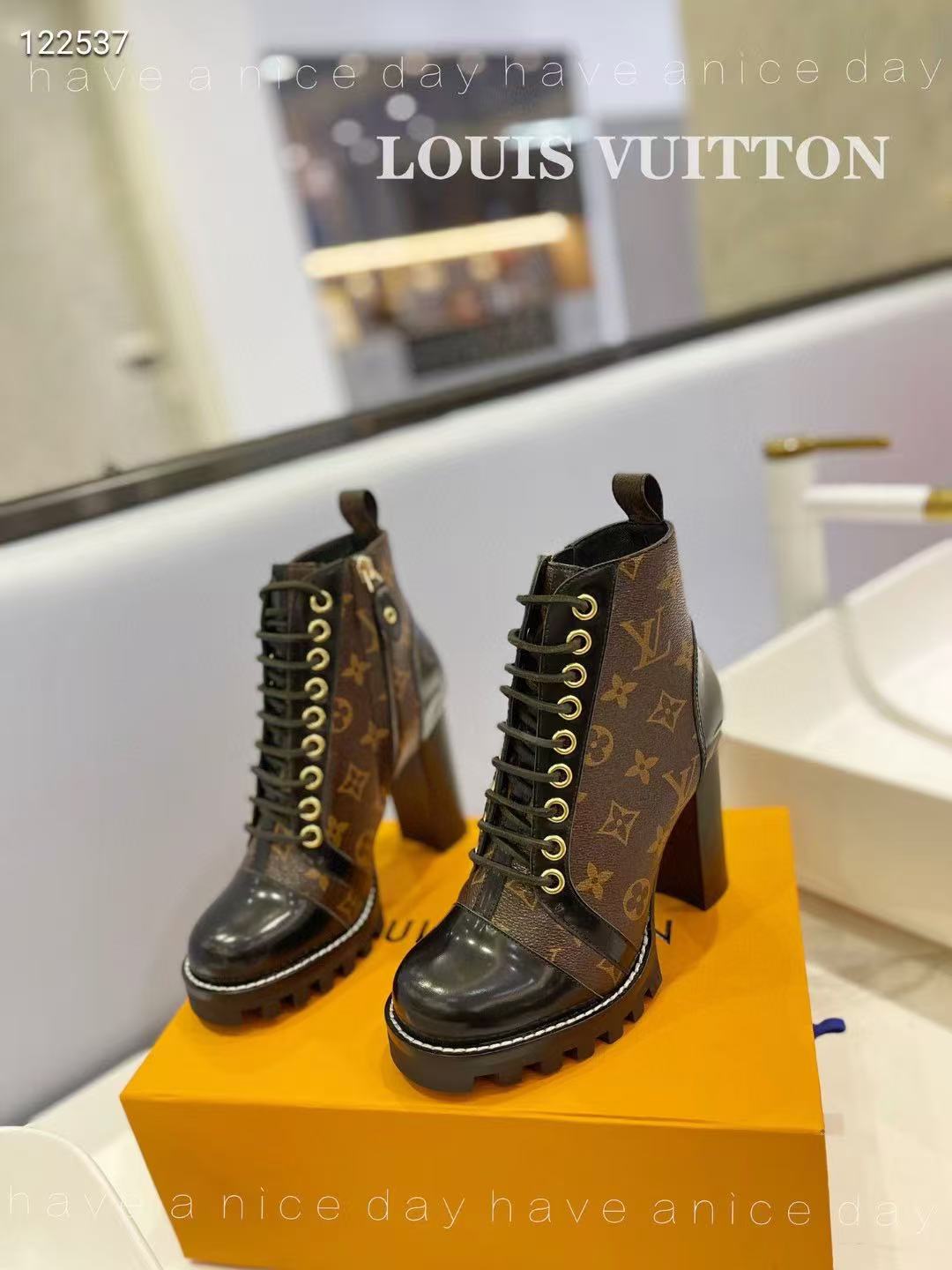 LV boots and high heels