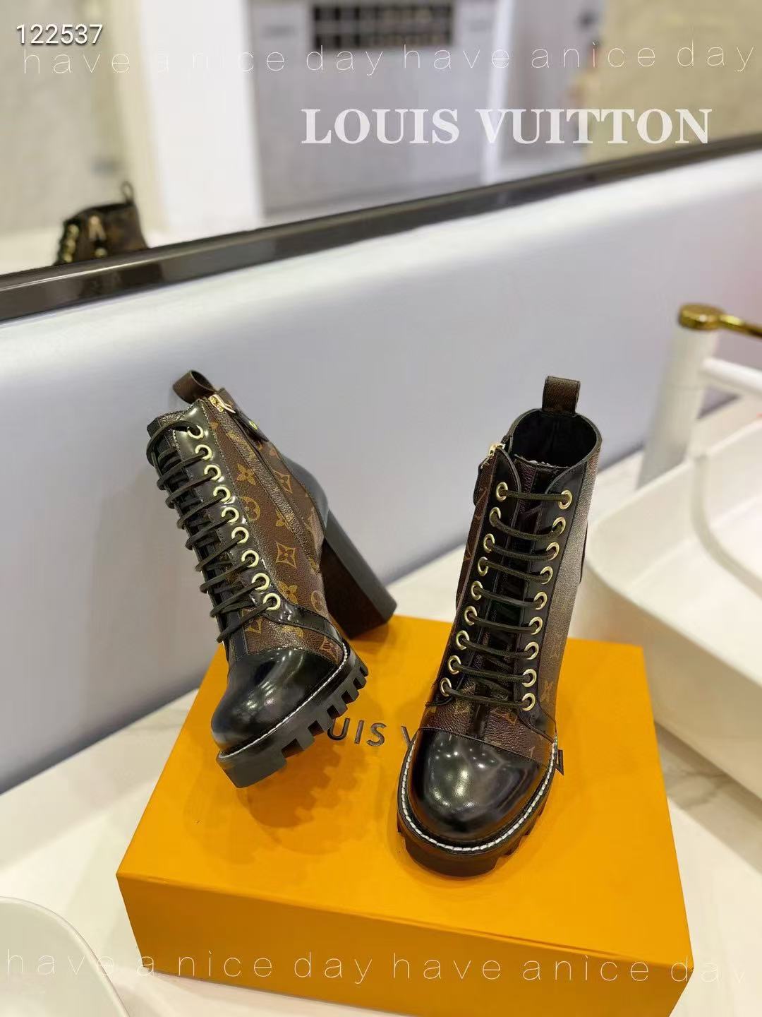 LV boots and high heels