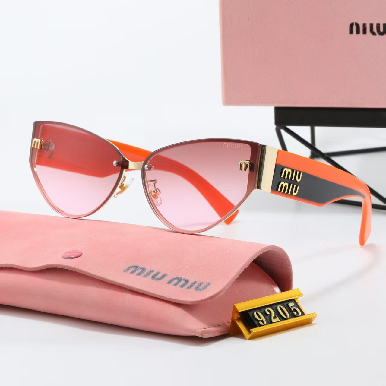 MIUMIU cat-eye playful sunglasses