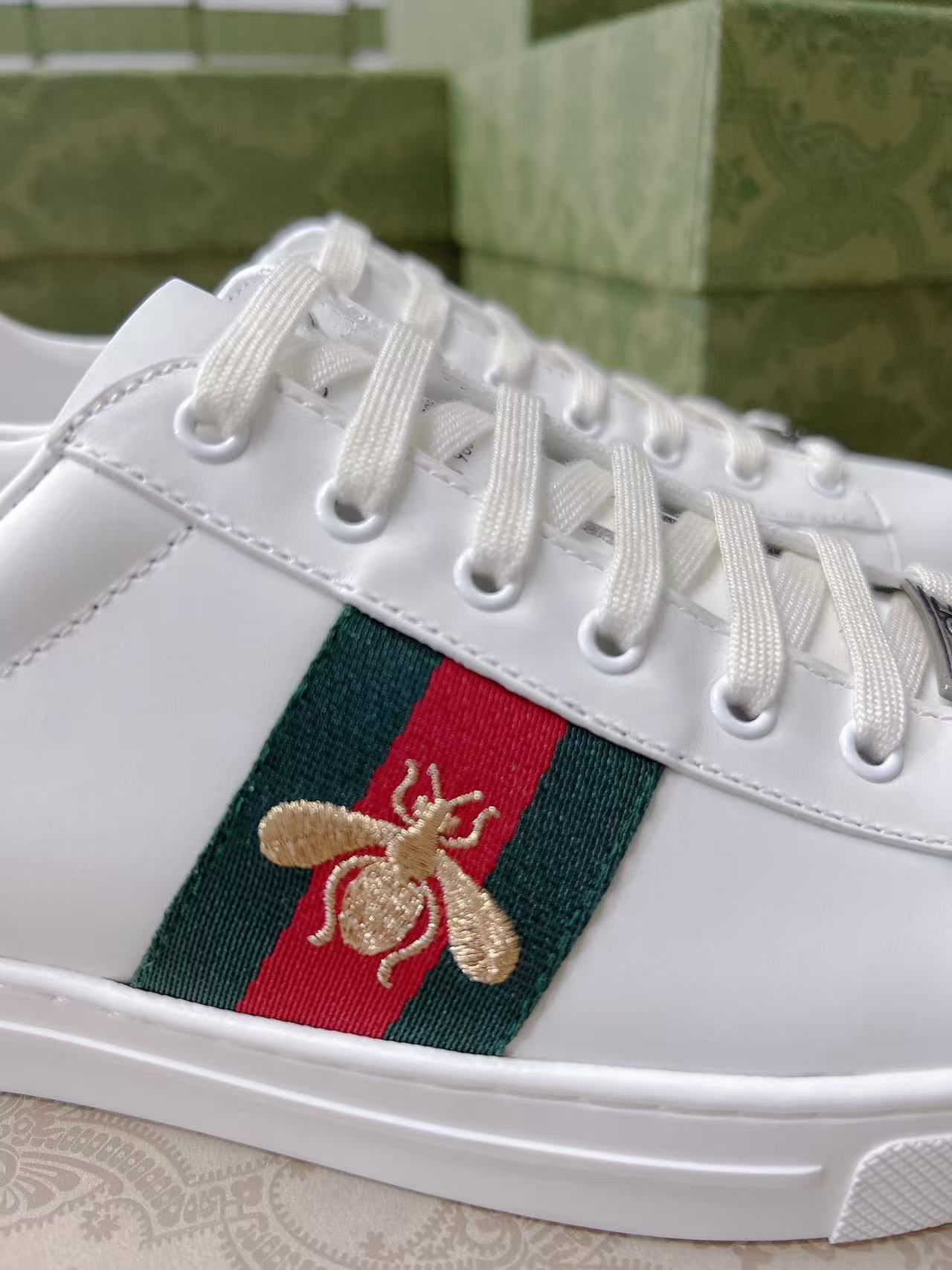 Gucci red and green snake-tail bee sneakers