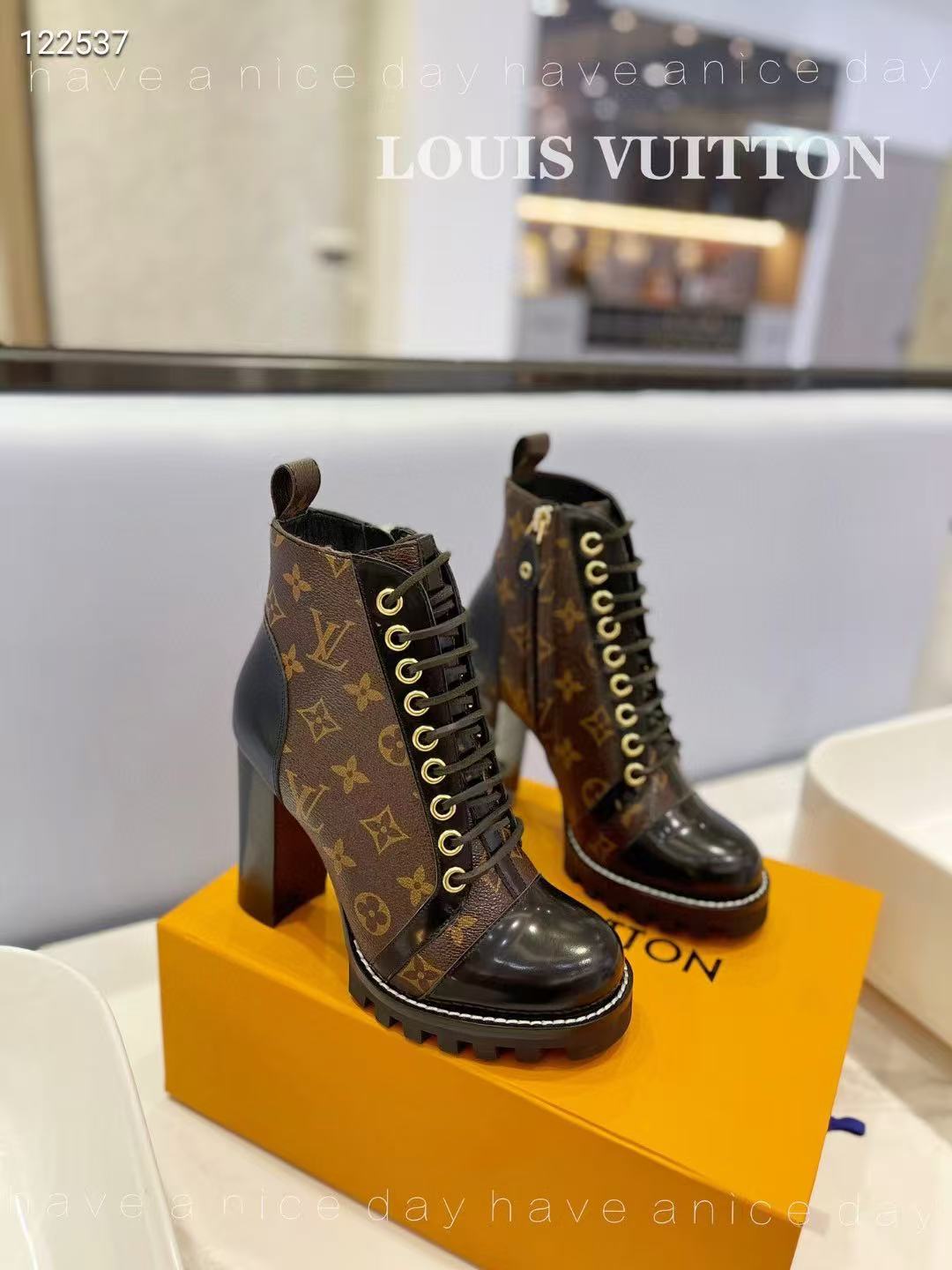 LV boots and high heels