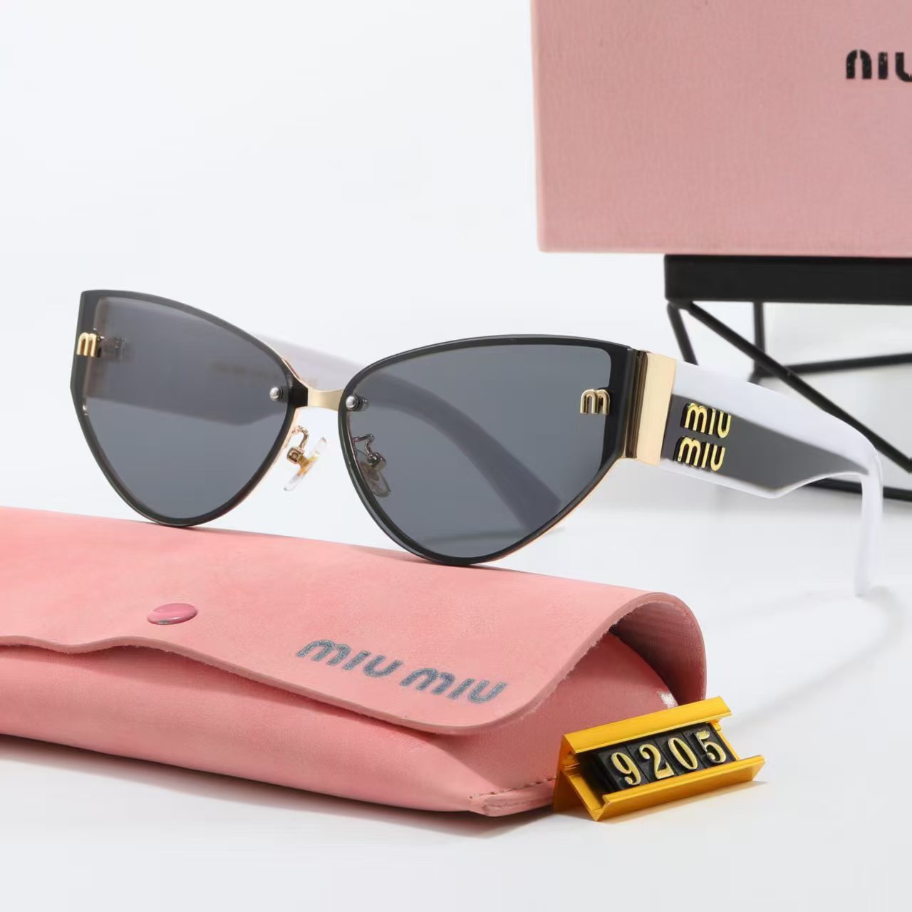 MIUMIU cat-eye playful sunglasses