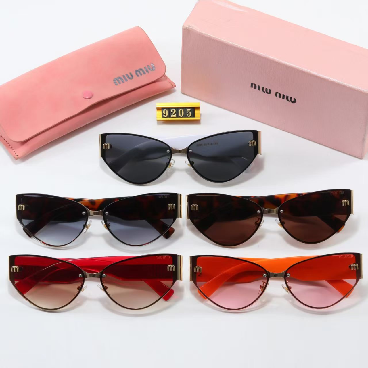 MIUMIU cat-eye playful sunglasses