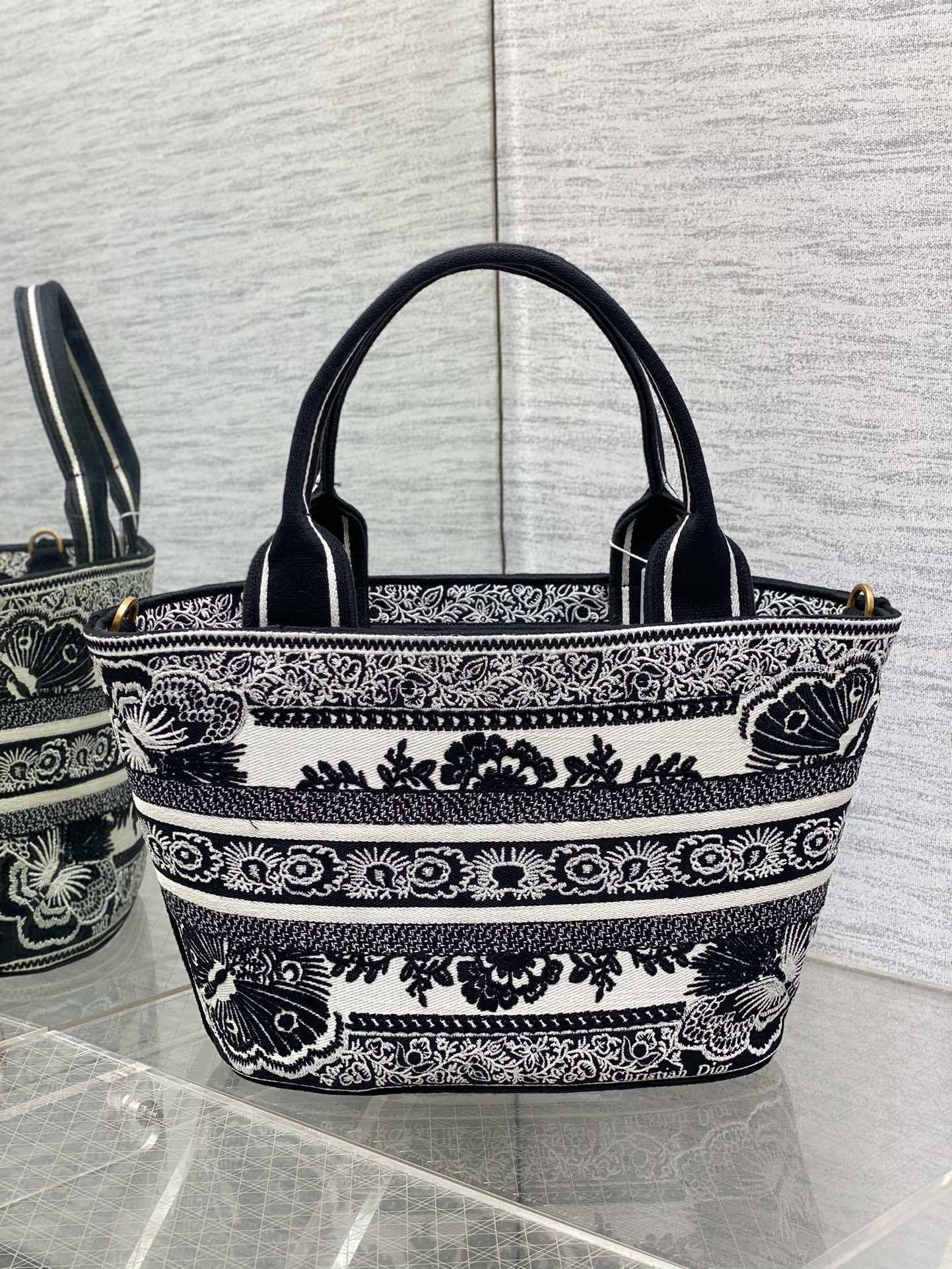 The DIOR basket embroidery handbag is of high quality