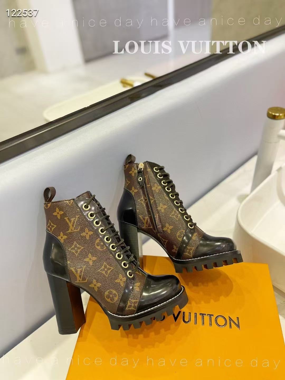 LV boots and high heels