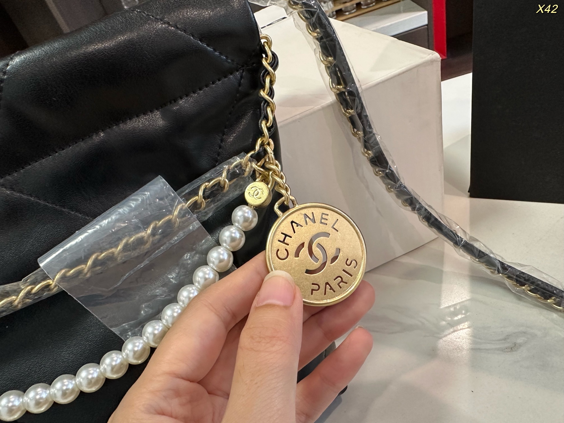 Chanel Pearl Trash Bag (Mini)