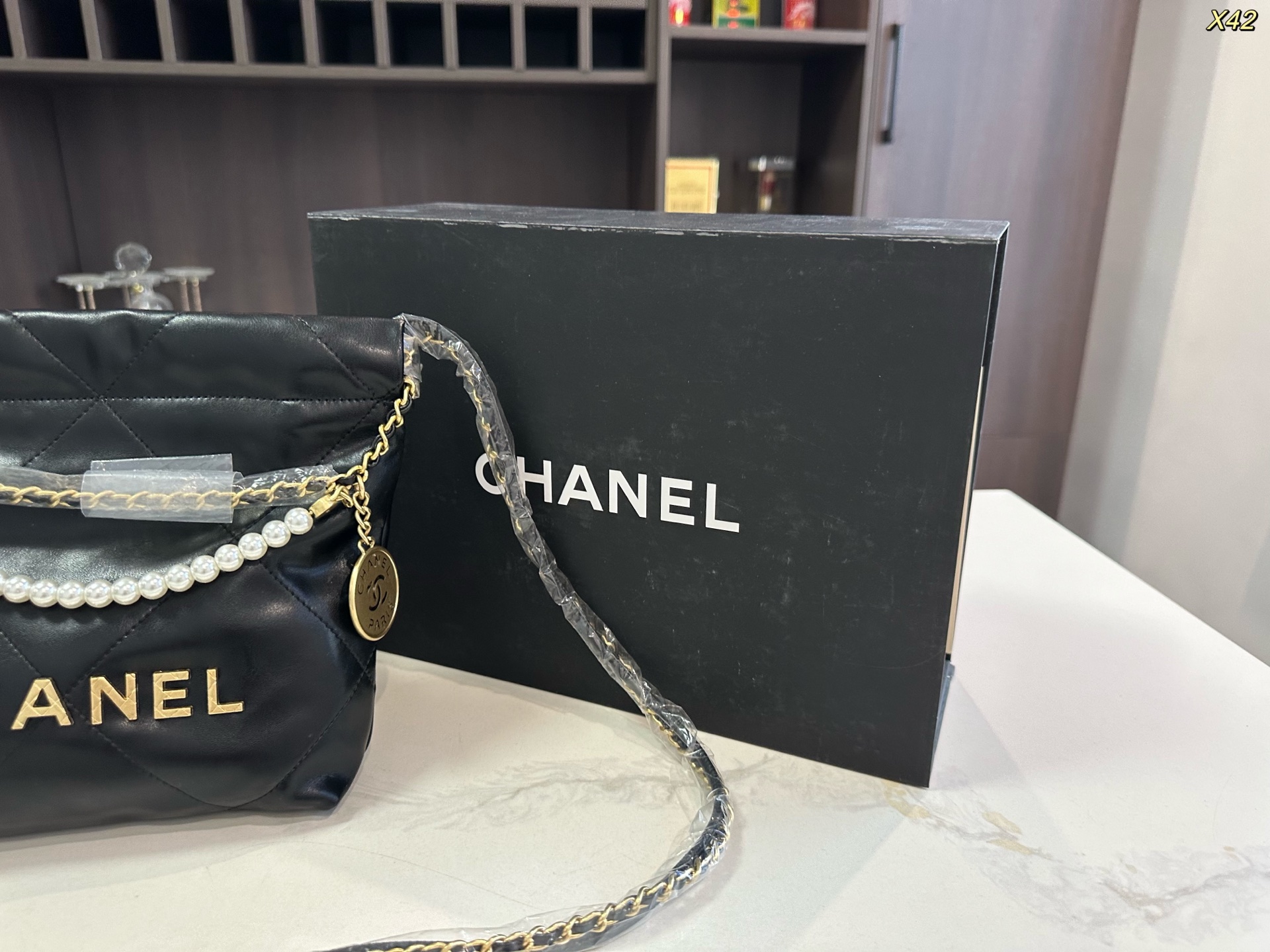 Chanel Pearl Trash Bag (Mini)