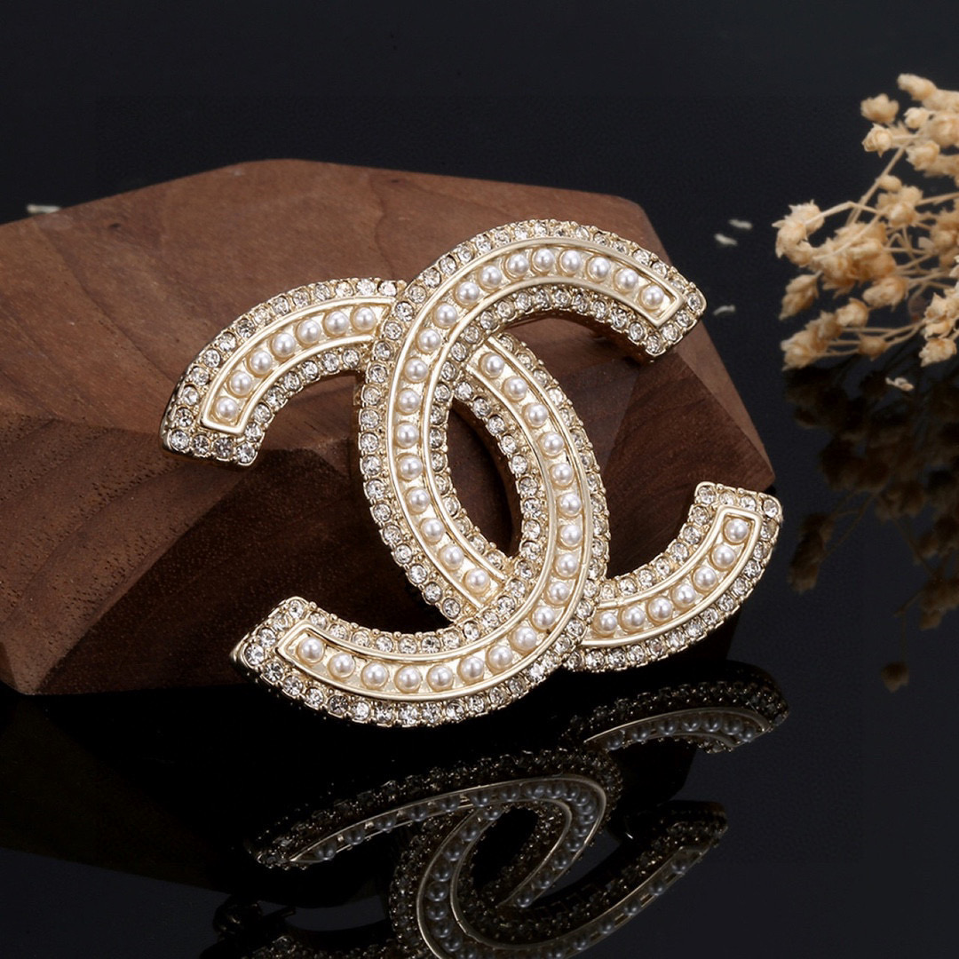 Chanel brooch full of diamonds