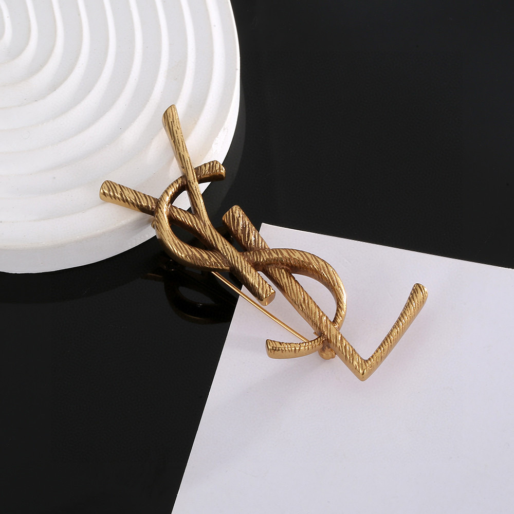 YSL brooch