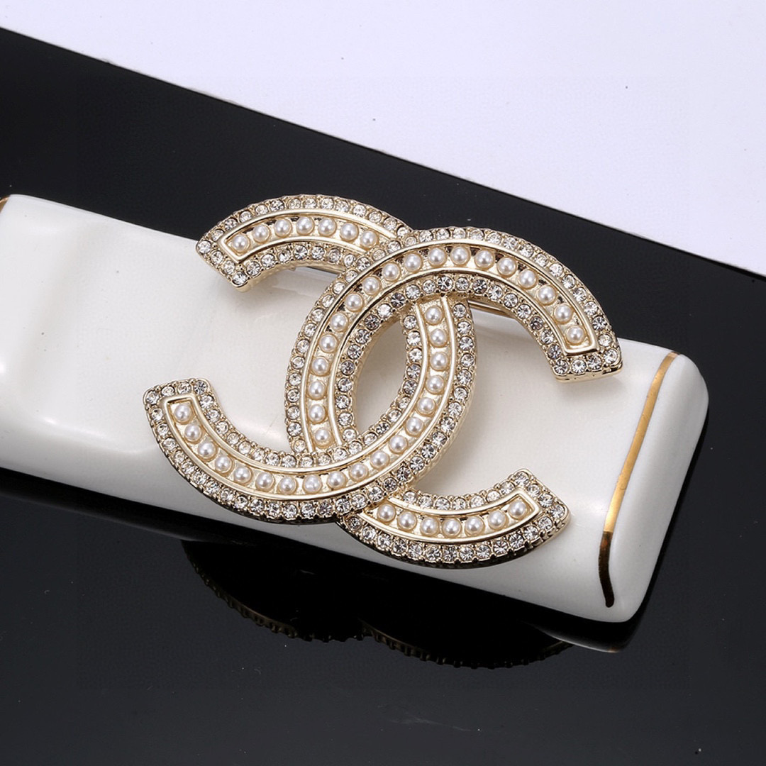 Chanel brooch full of diamonds