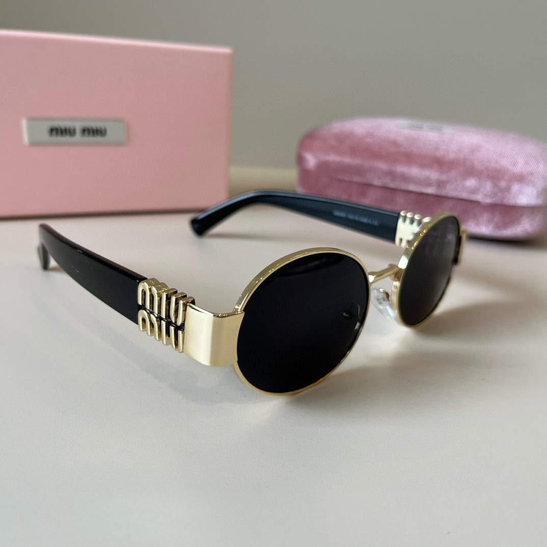 MIUMIU round sunglasses