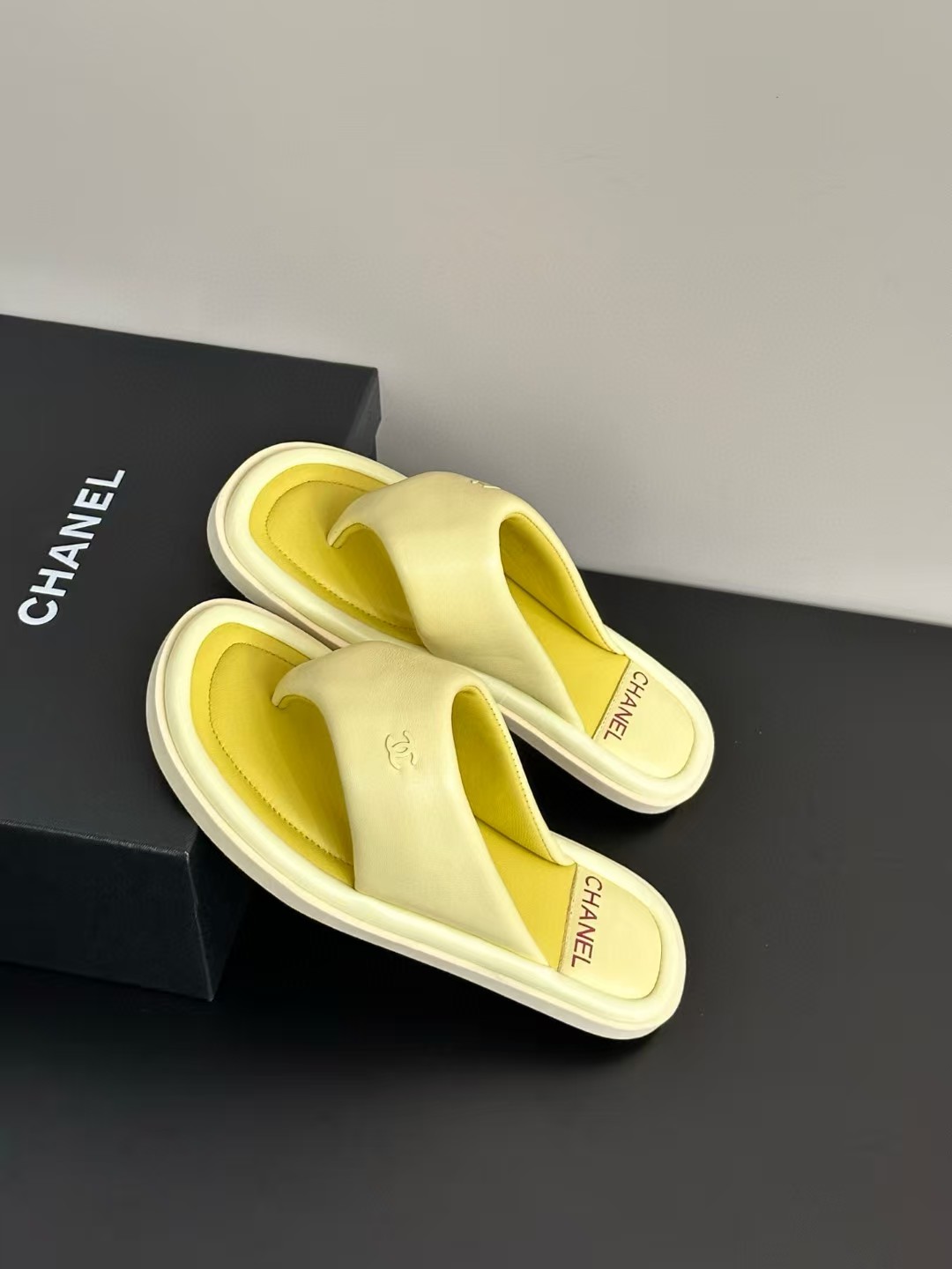Chanel bread flip-flops