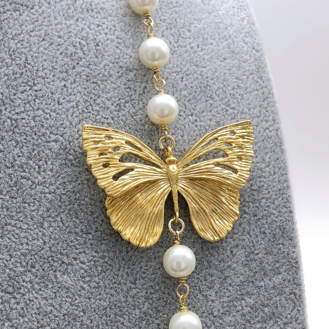 Chanel butterfly sweater chain