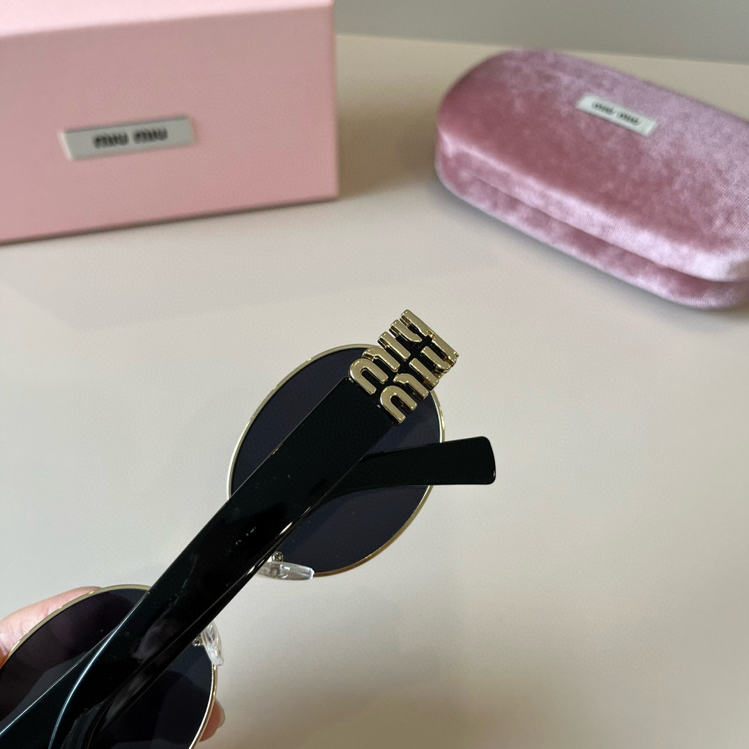 MIUMIU round sunglasses