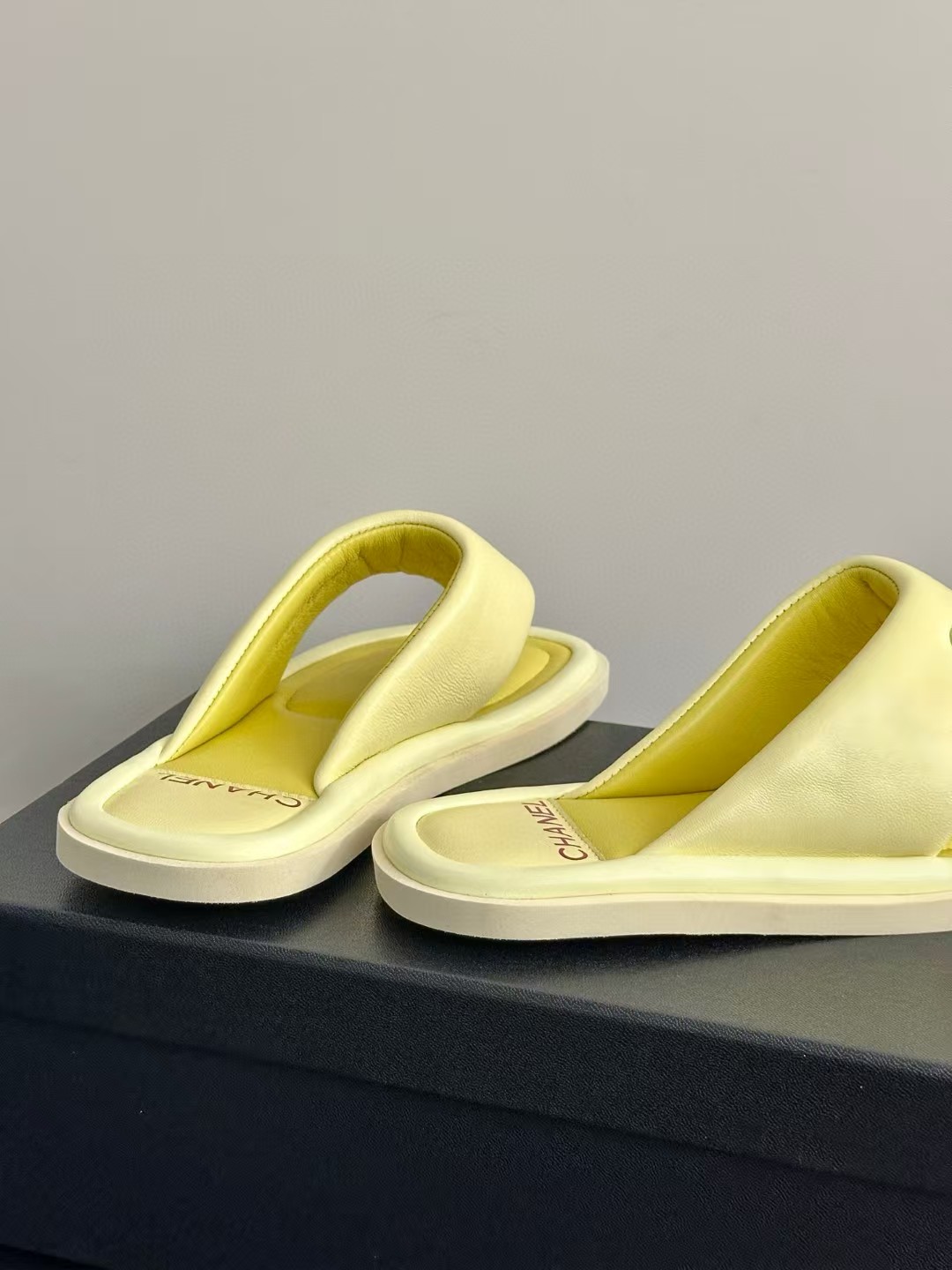 Chanel bread flip-flops