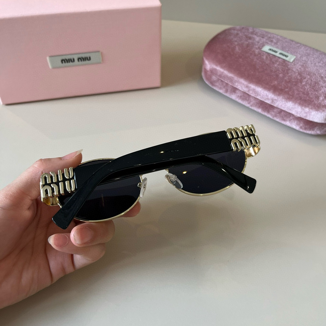 MIUMIU round sunglasses