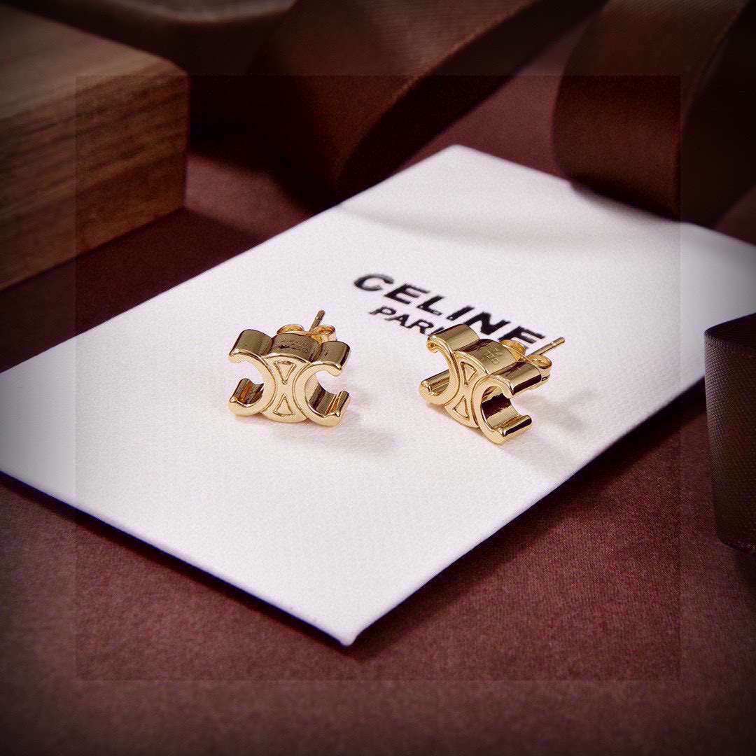 Celine's new golden arc de Triomphe stud earrings