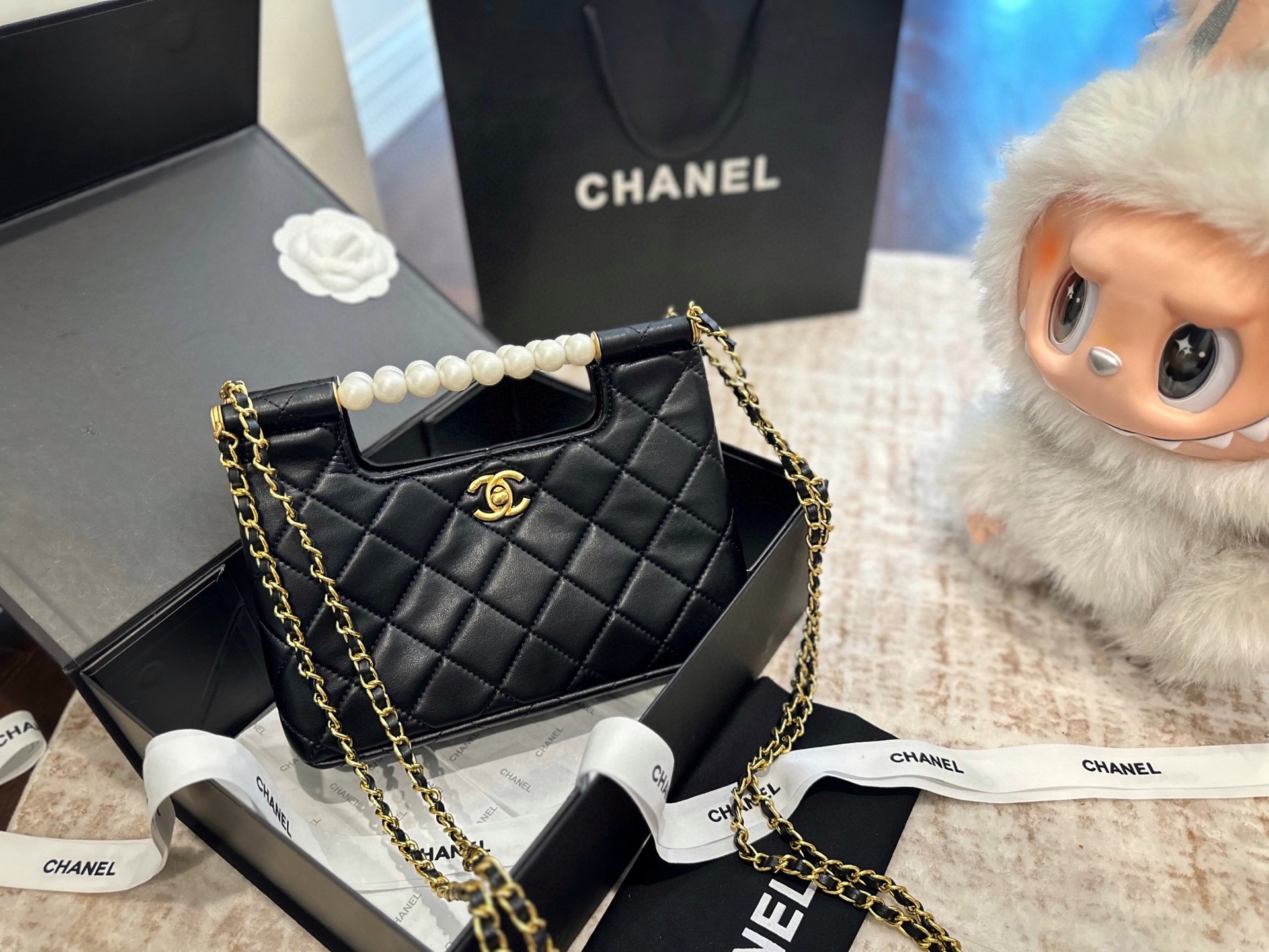 Chanel 25P pearl handle bag