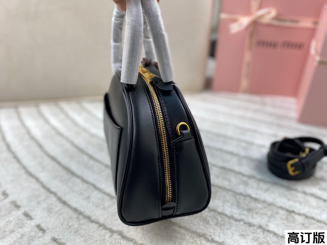 Miumiu half-moon handbag