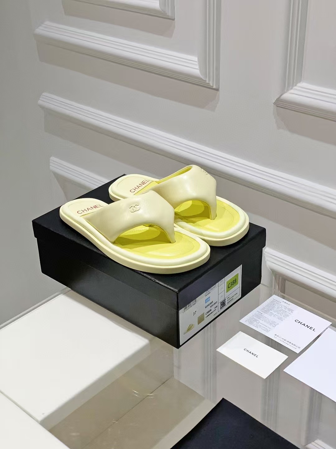 Chanel bread flip-flops