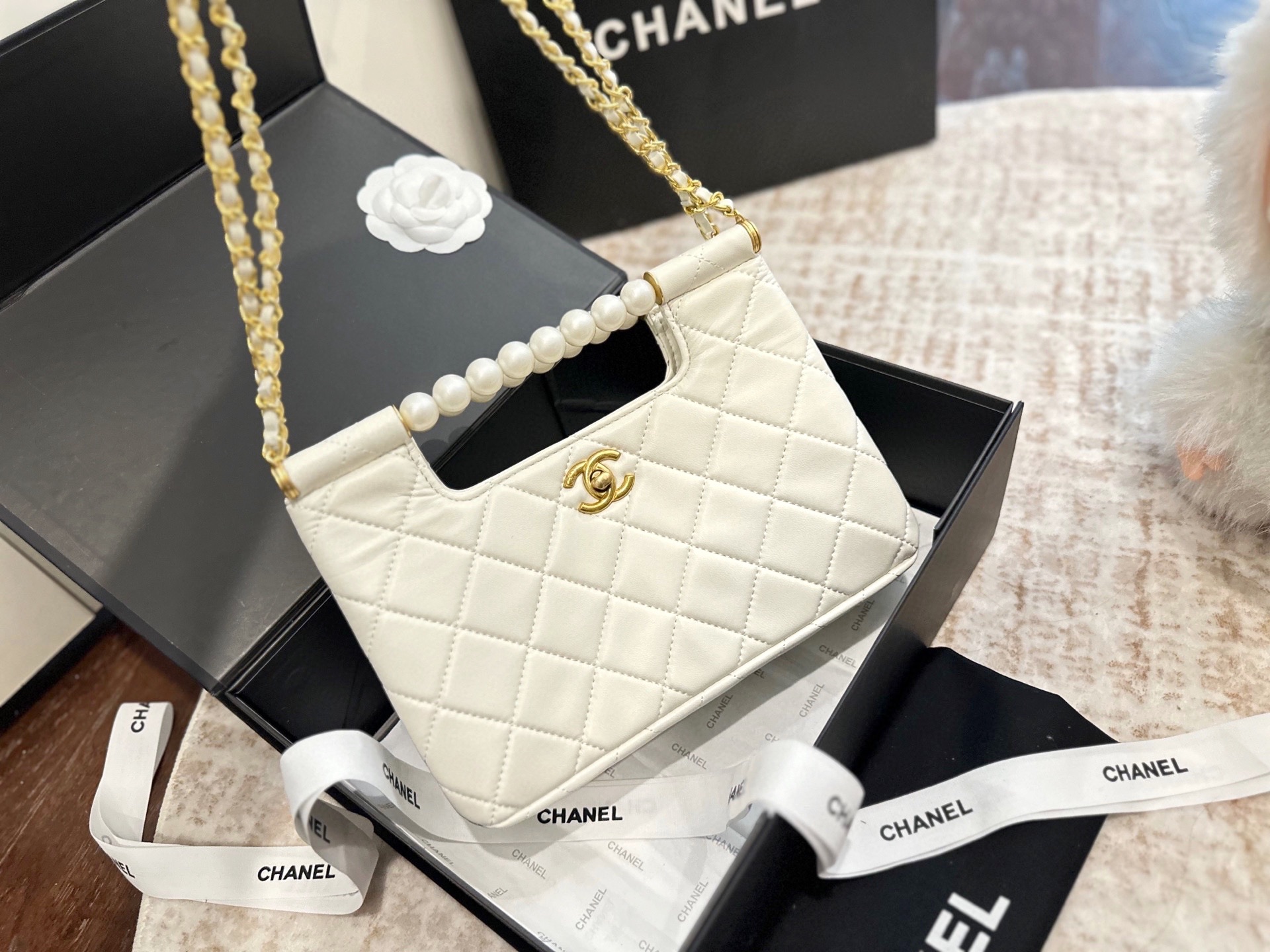 Chanel 25P pearl handle bag
