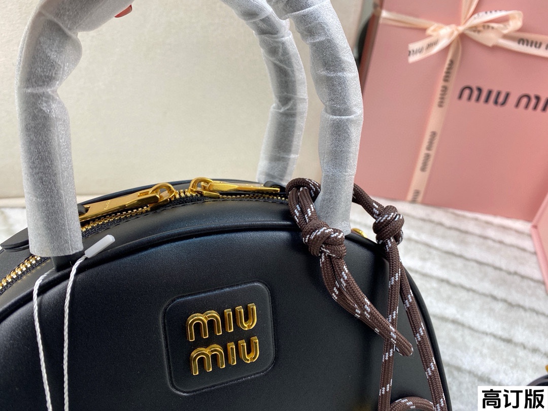 Miumiu half-moon handbag