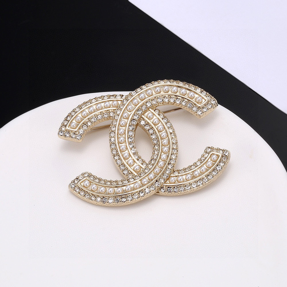 Chanel brooch full of diamonds