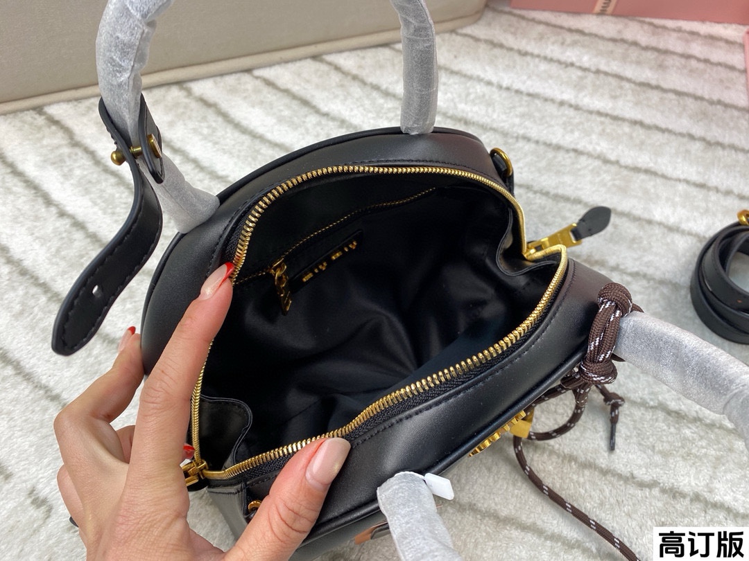 Miumiu half-moon handbag