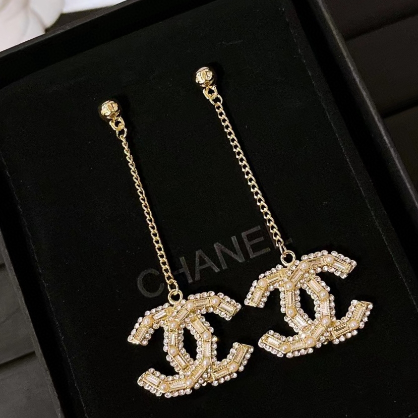 Chanel pearl tassel stud earrings