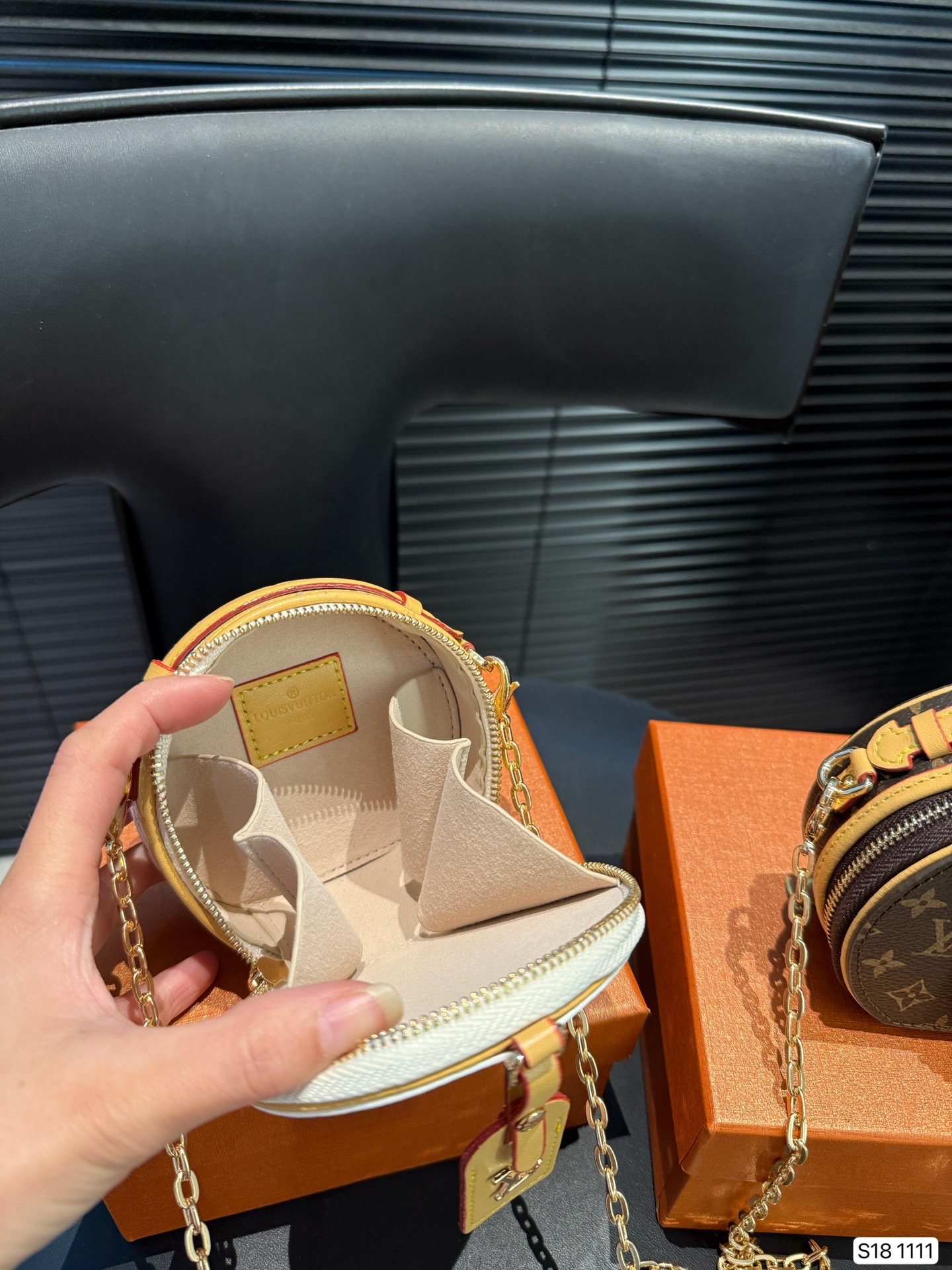 LV round pancake coin purse