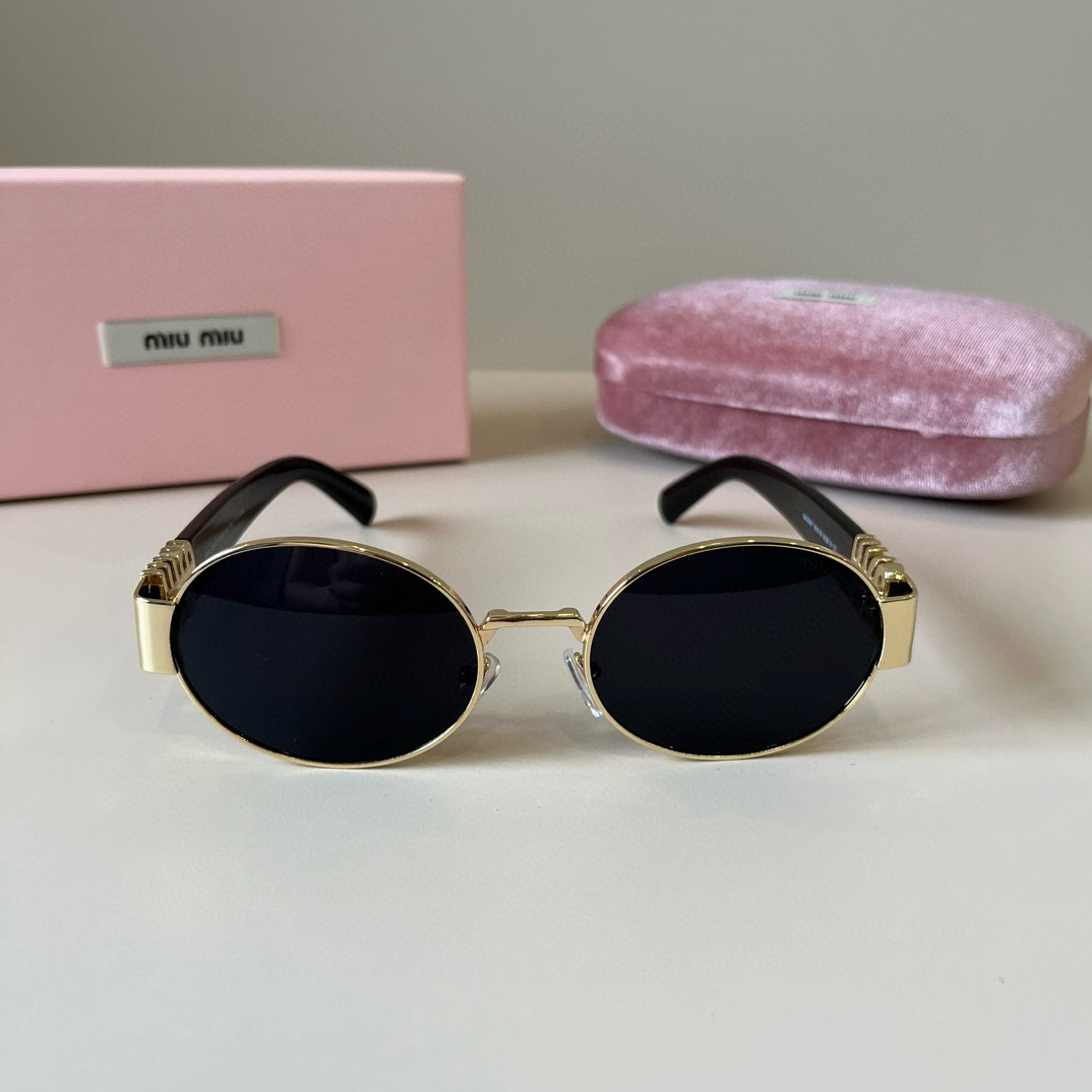 MIUMIU round sunglasses