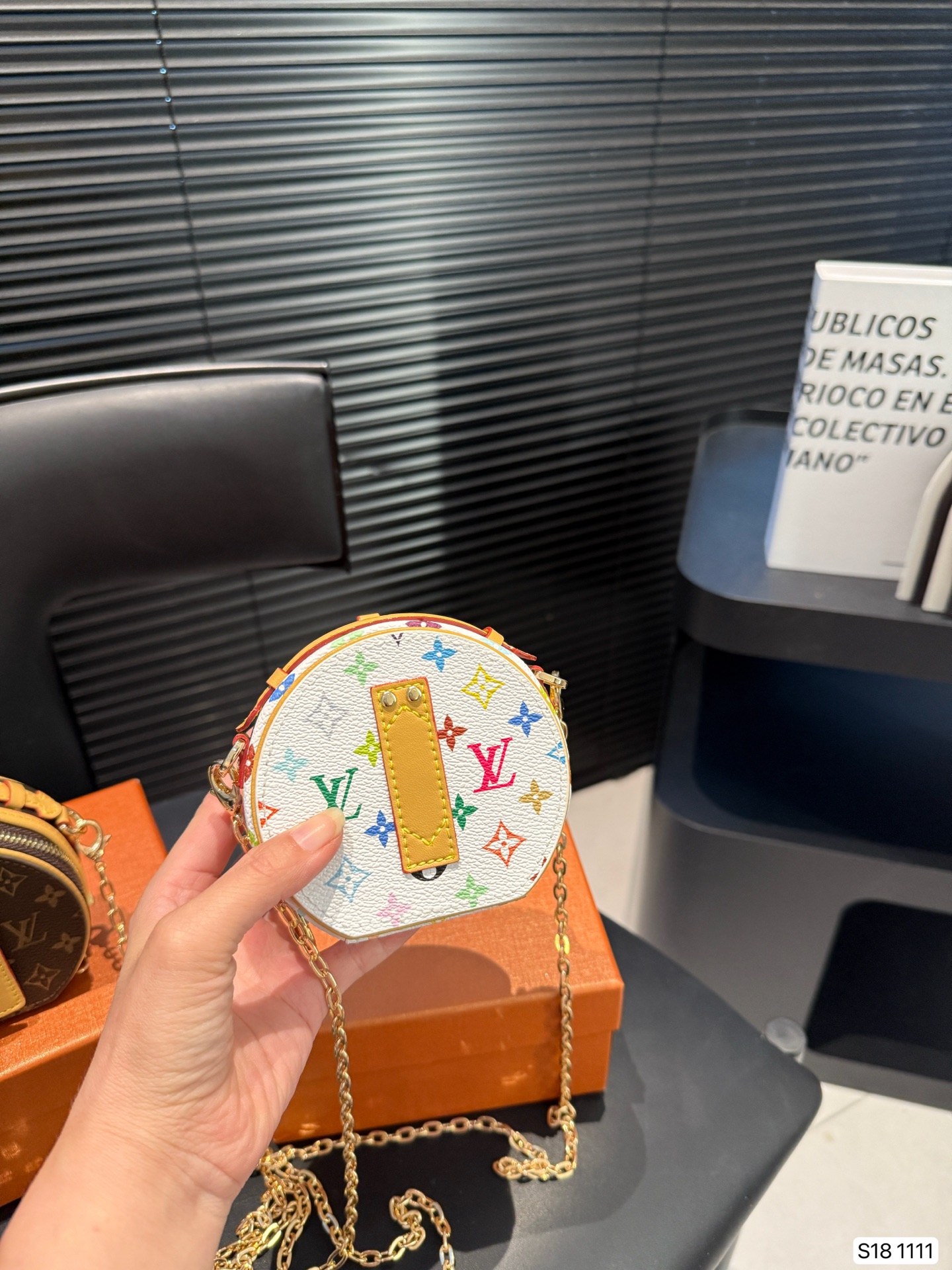 LV round pancake coin purse