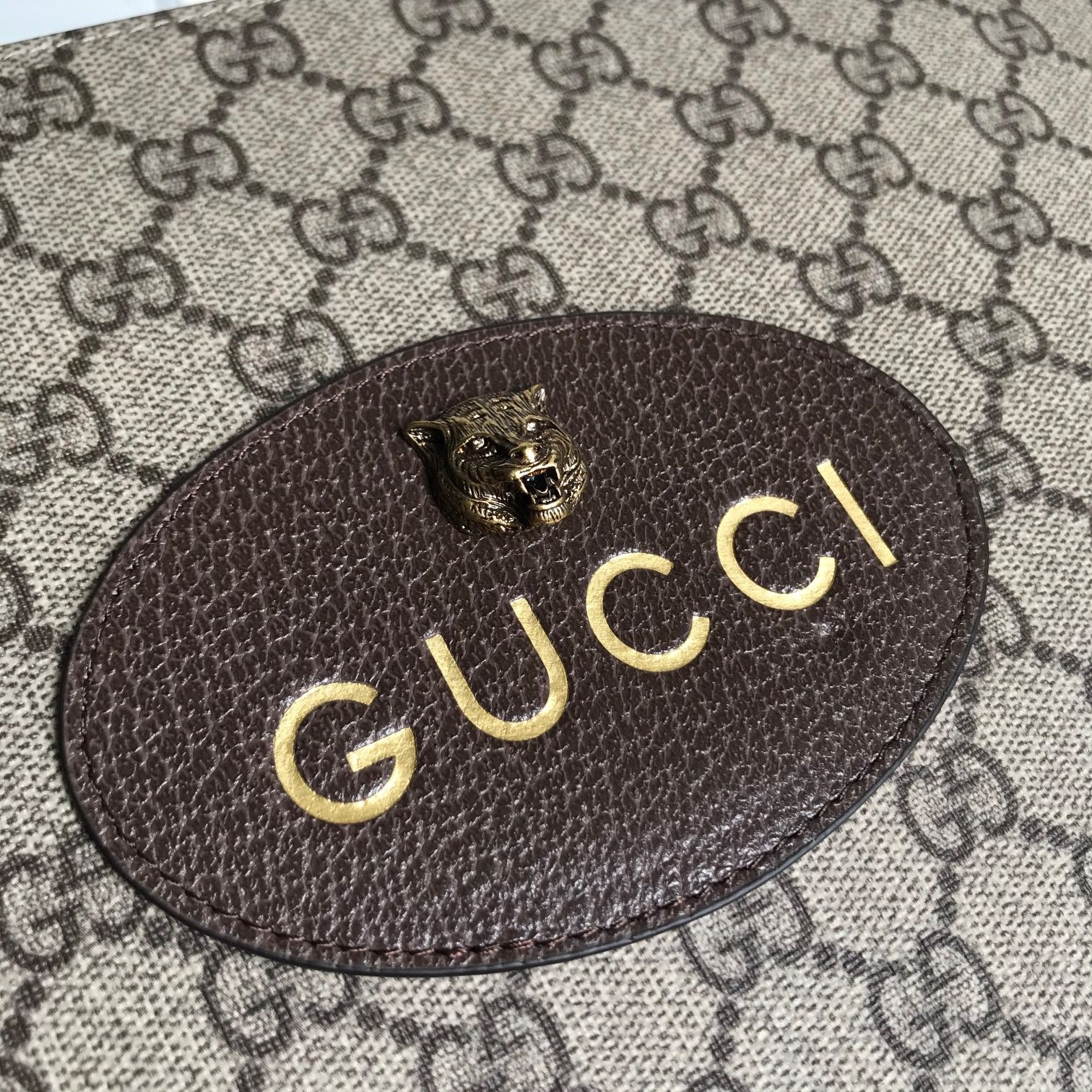 Gucci Tiger-head printed handbag