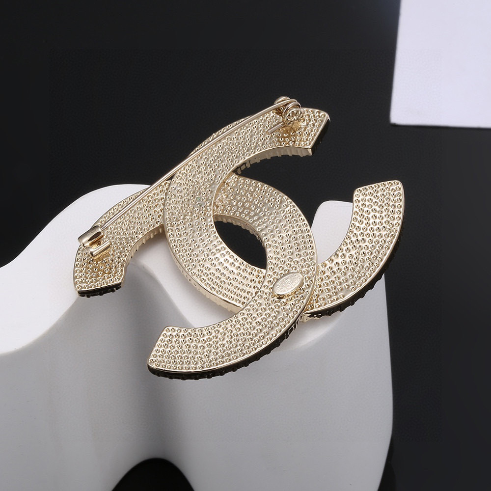 Chanel brooch full of diamonds