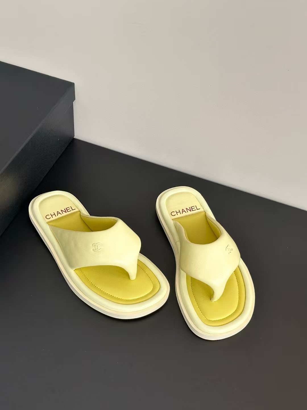 Chanel bread flip-flops