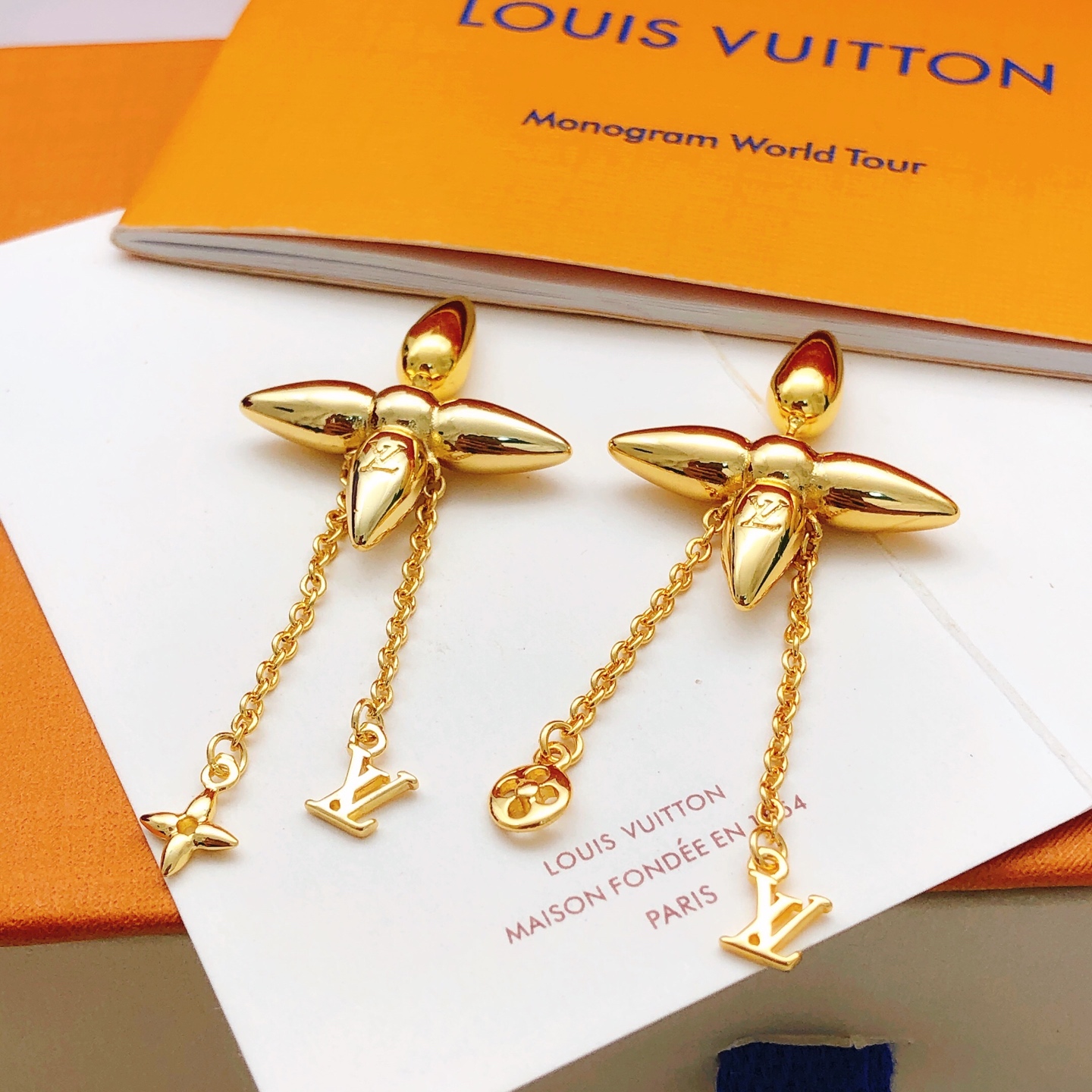 LV polished tassel earrings