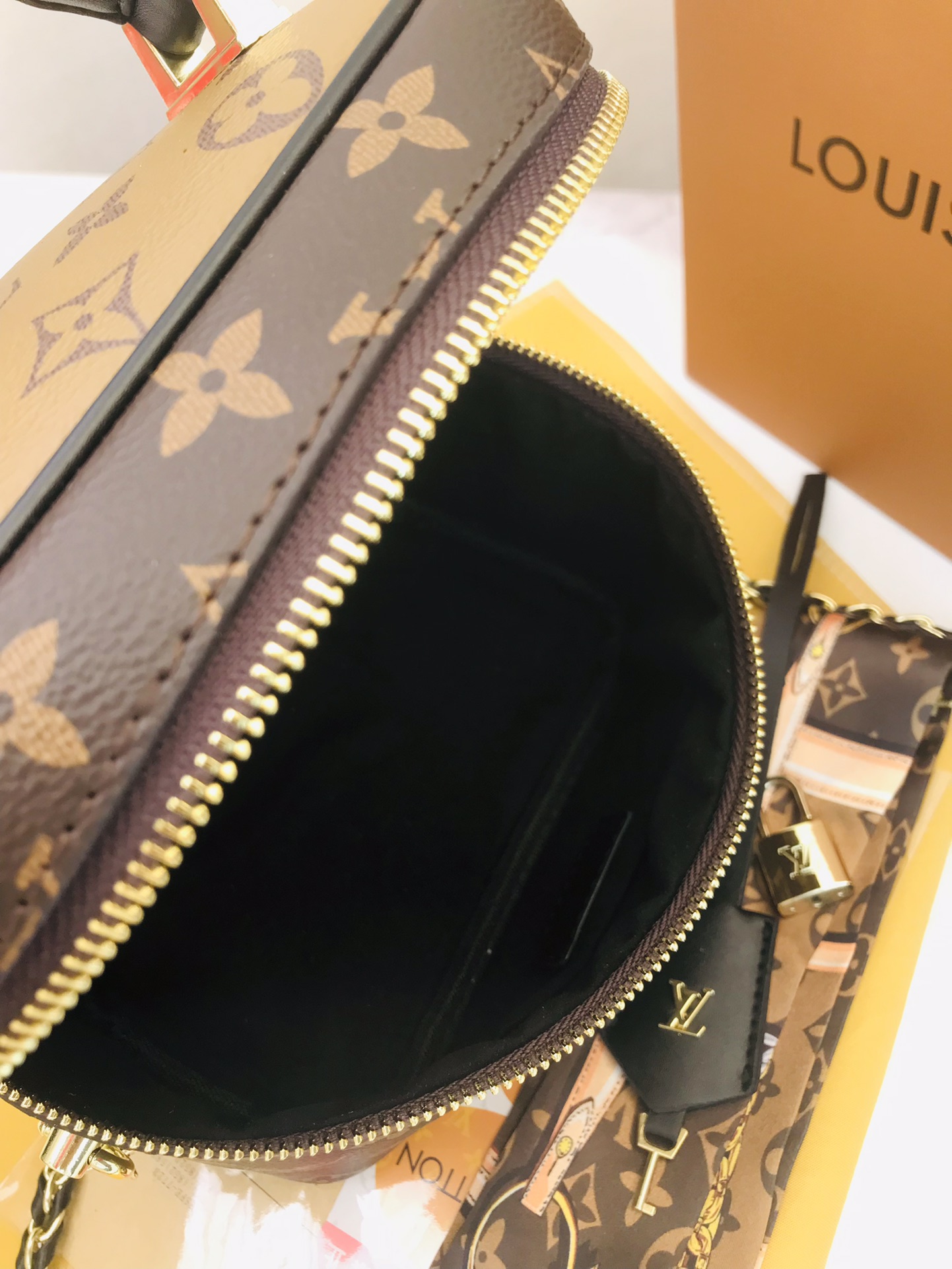 LV single-shoulder makeup bag