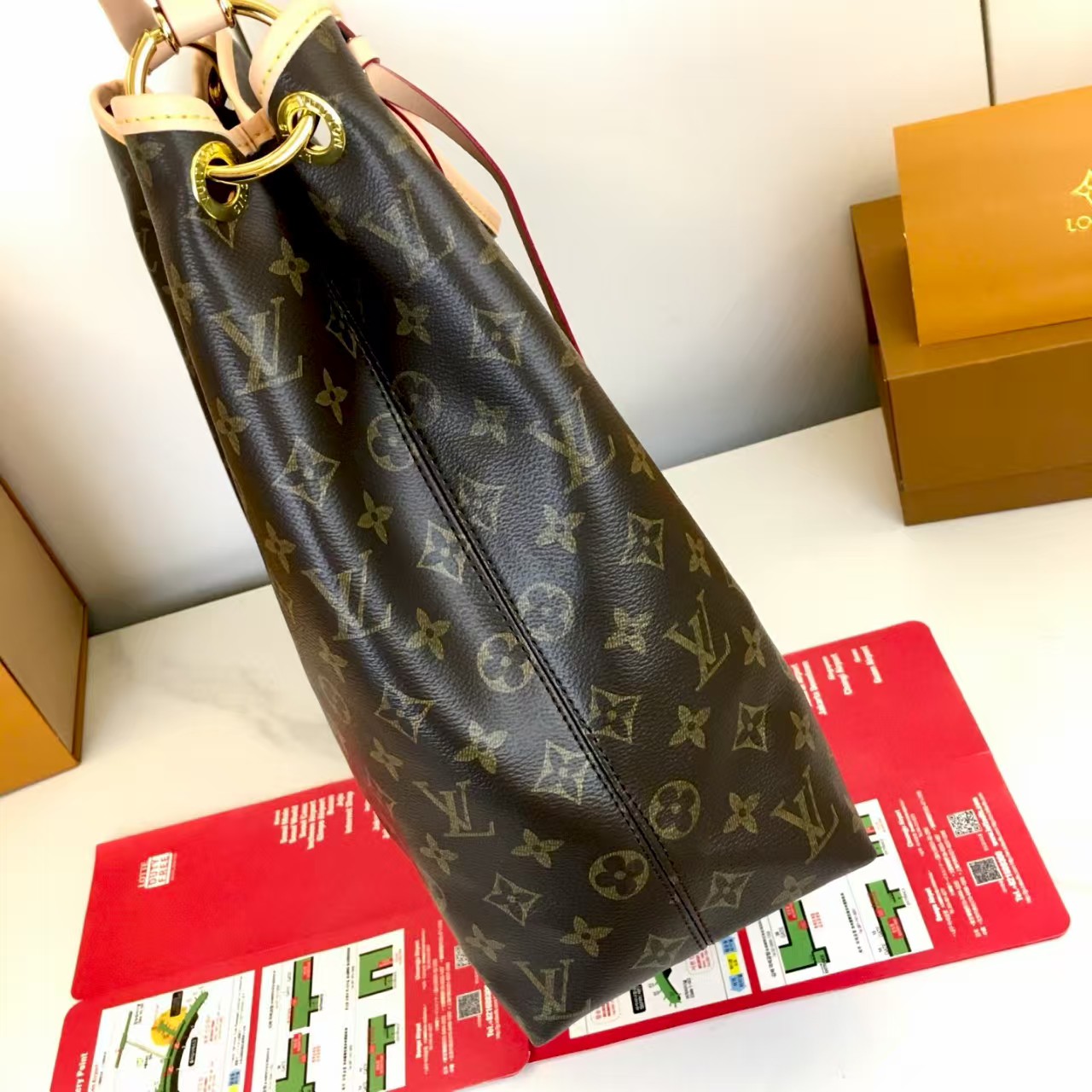 LV again artsy monogram handbag