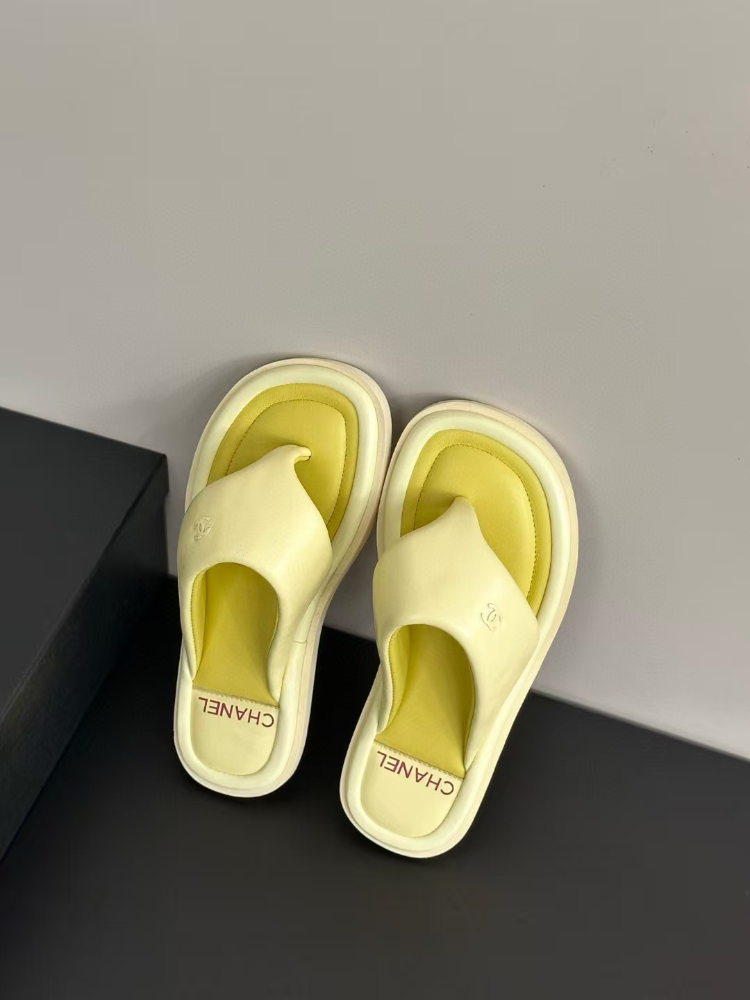 Chanel bread flip-flops