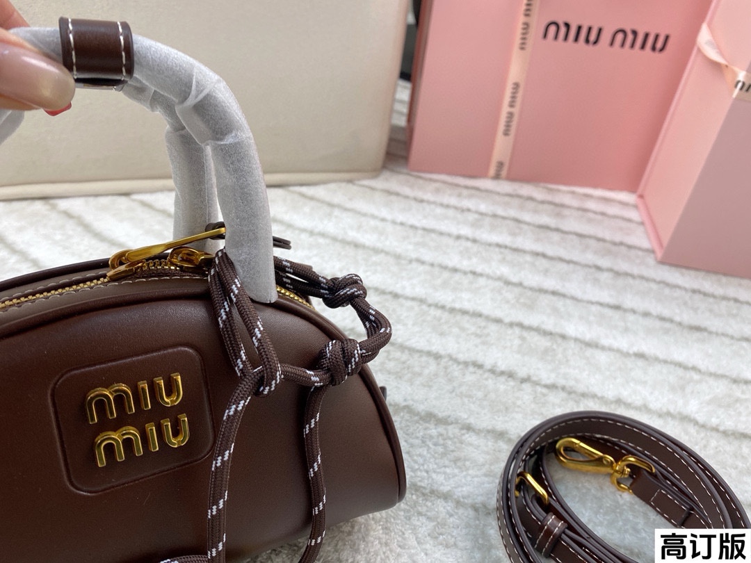 Miumiu half-moon handbag