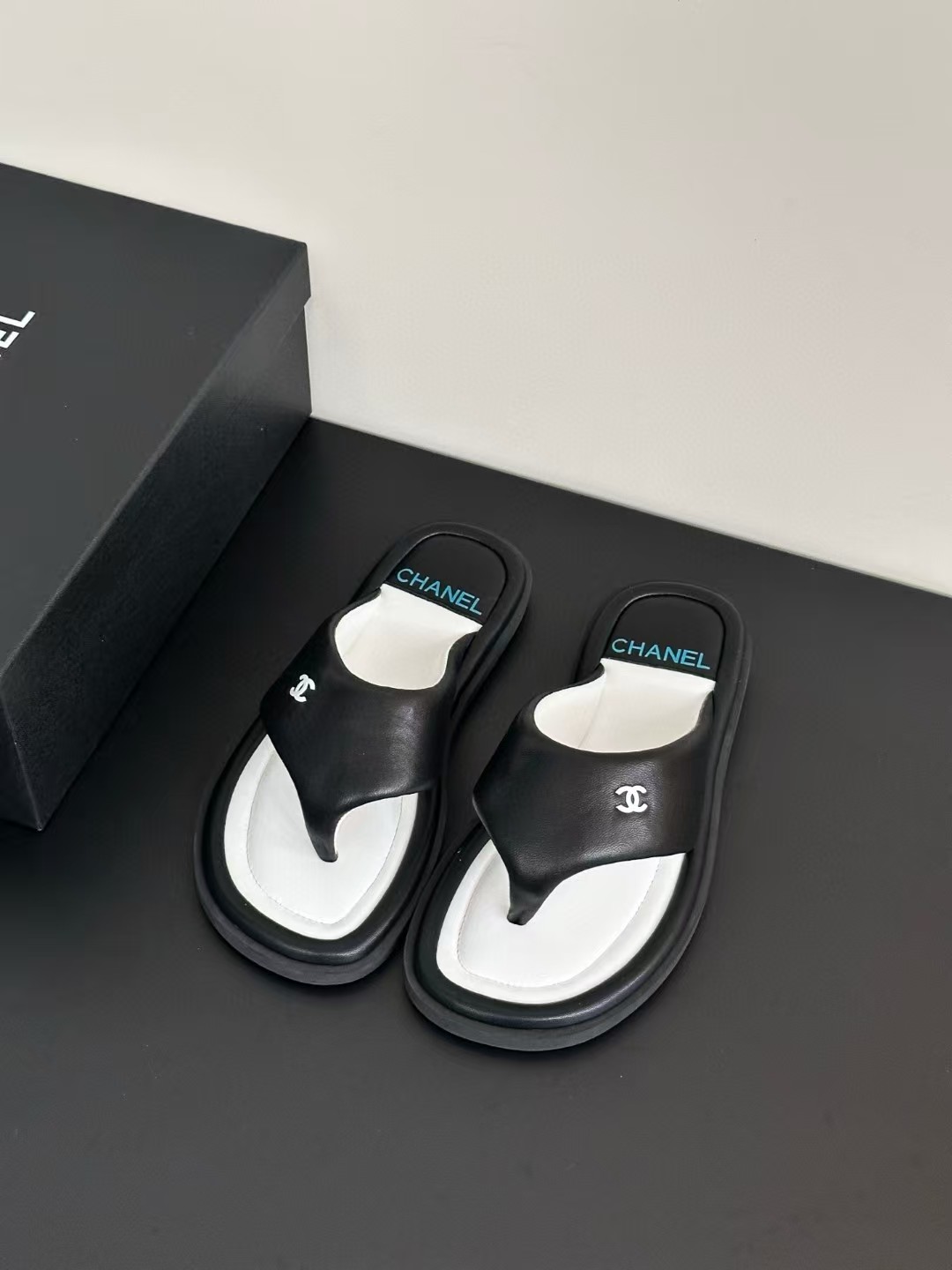 Chanel bread flip-flops