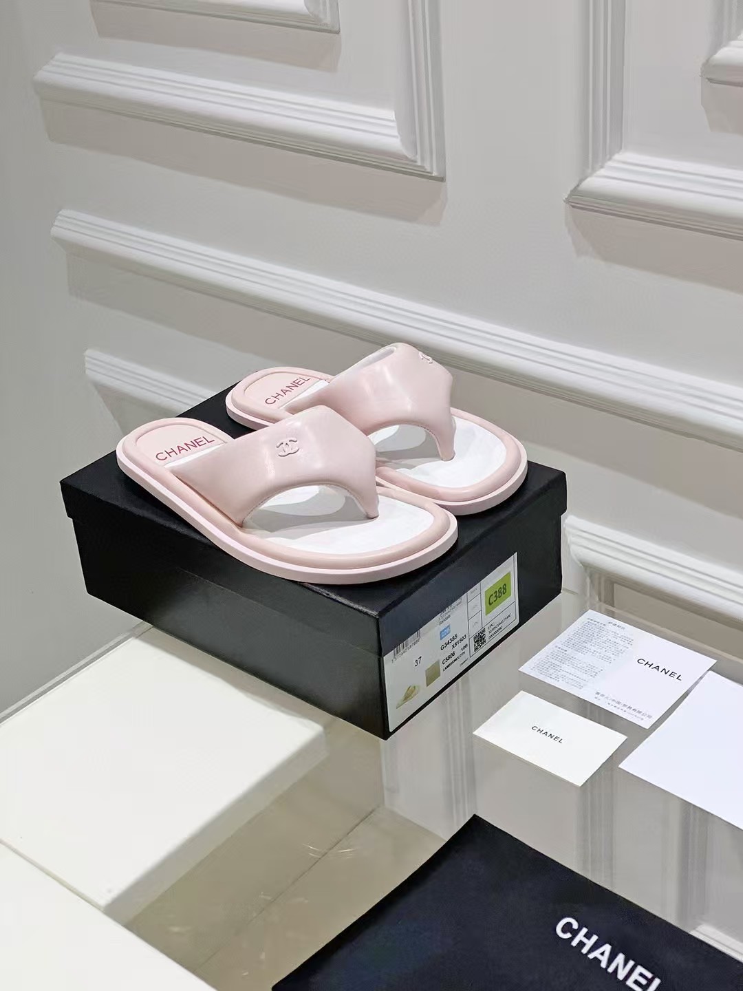 Chanel bread flip-flops