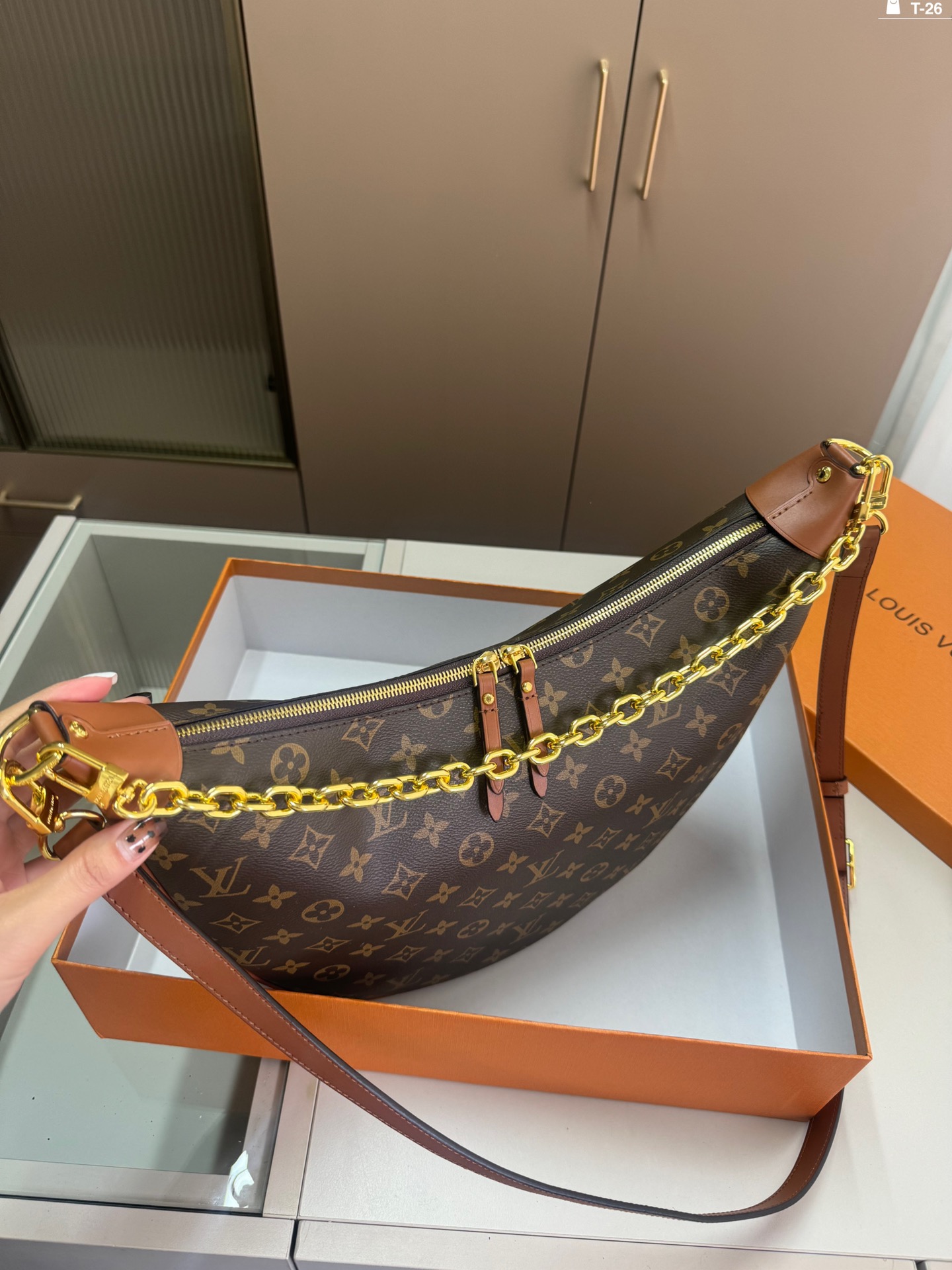LV crescent-shaped bag chain strap shoulder bag
